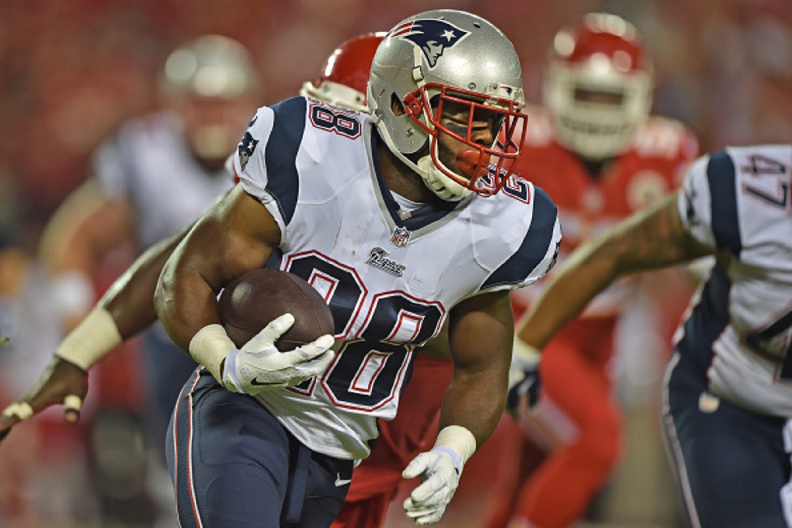 KANSAS CITY, MO - SEPTEMBER 29:  Running back James White #28 of the New England Patriots rushes up field against the Kansas City Chiefs during the second half on September 29, 2014 at Arrowhead Stadium in Kansas City, Missouri.  (Photo by Peter G. Aiken/