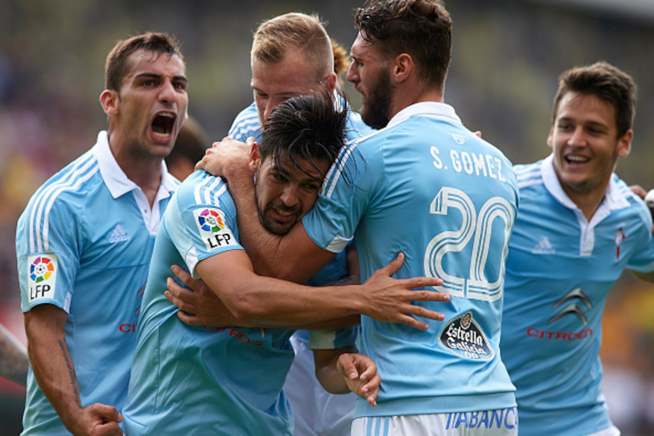 VILLARREAL, SPAIN - OCTOBER 18: Nolito of Celta celebrates scoring his team's second goal with his teammates Sergi Gomez, John Guidetti and Jonathan Castro (L) during the La Liga match between Villarreal CF and RC Celta de Vigo at El Madrigal Stadium on VILLARREAL, SPAIN - OCTOBER 18: Nolito of Celta celebrates scoring his team's second goal with his teammates Sergi Gomez, John Guidetti and Jonathan Castro (L) during the La Liga match between Villarreal CF and RC Celta de Vigo at El Madrigal Stadium on