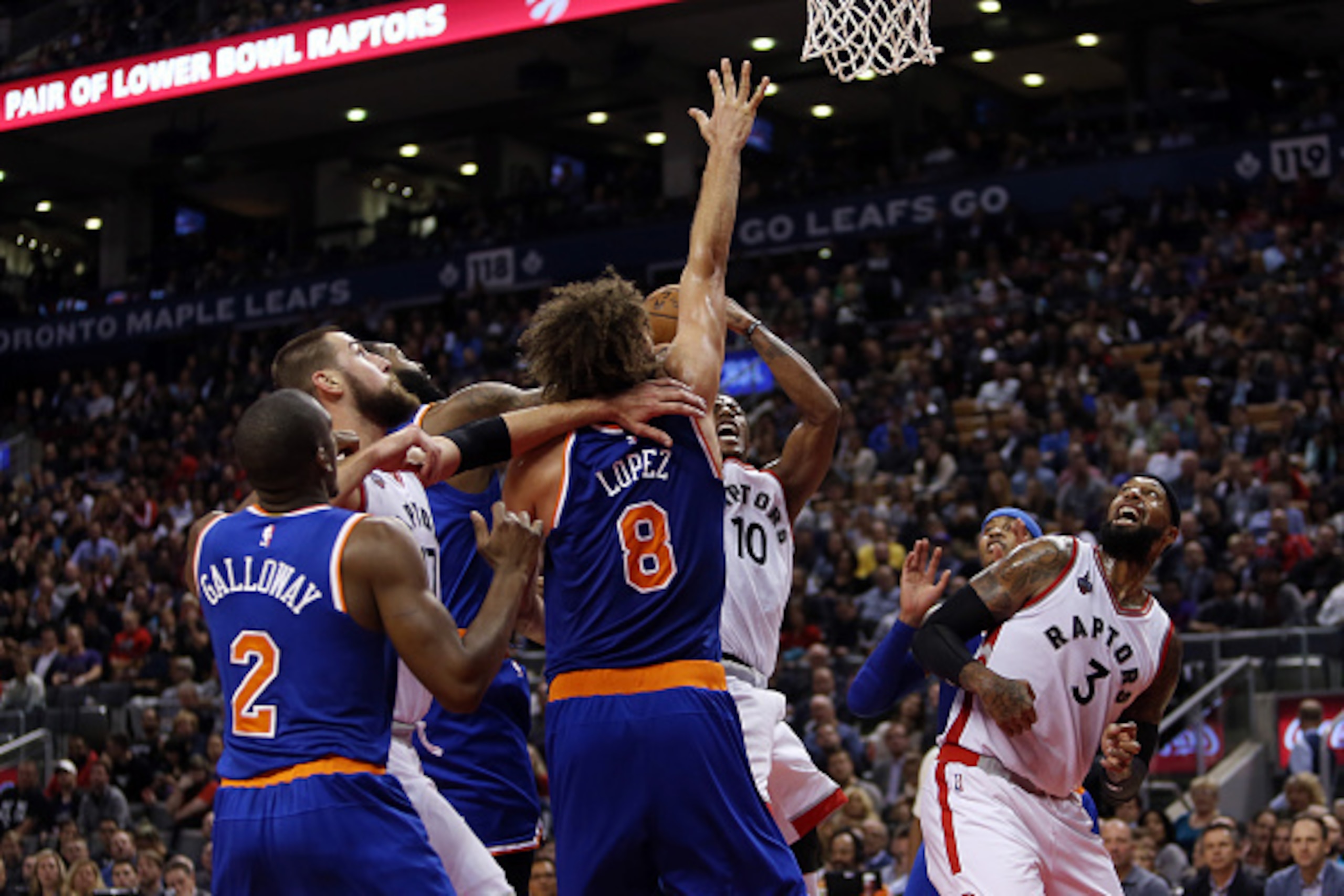 TORONTO, ON - NOVEMBER 10:  DeMar DeRozan #10 of the Toronto Raptors is fouled during an NBA game against the New York Knicks at the Air Canada Centre on November 10, 2015 in Toronto, Ontario, Canada.  NOTE TO USER: User expressly acknowledges and agrees 