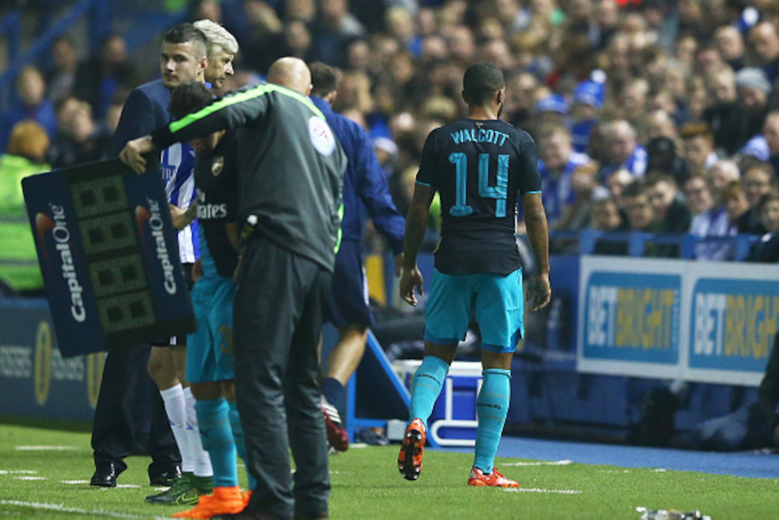 SHEFFIELD, ENGLAND - OCTOBER 27:  First half substitute Theo Walcott of Arsenal comes off injured after coming on to replace Alex Oxlade-Chamberlain of Arsenal during the Capital One Cup fourth round match between Sheffield Wednesday and Arsenal at Hillsb