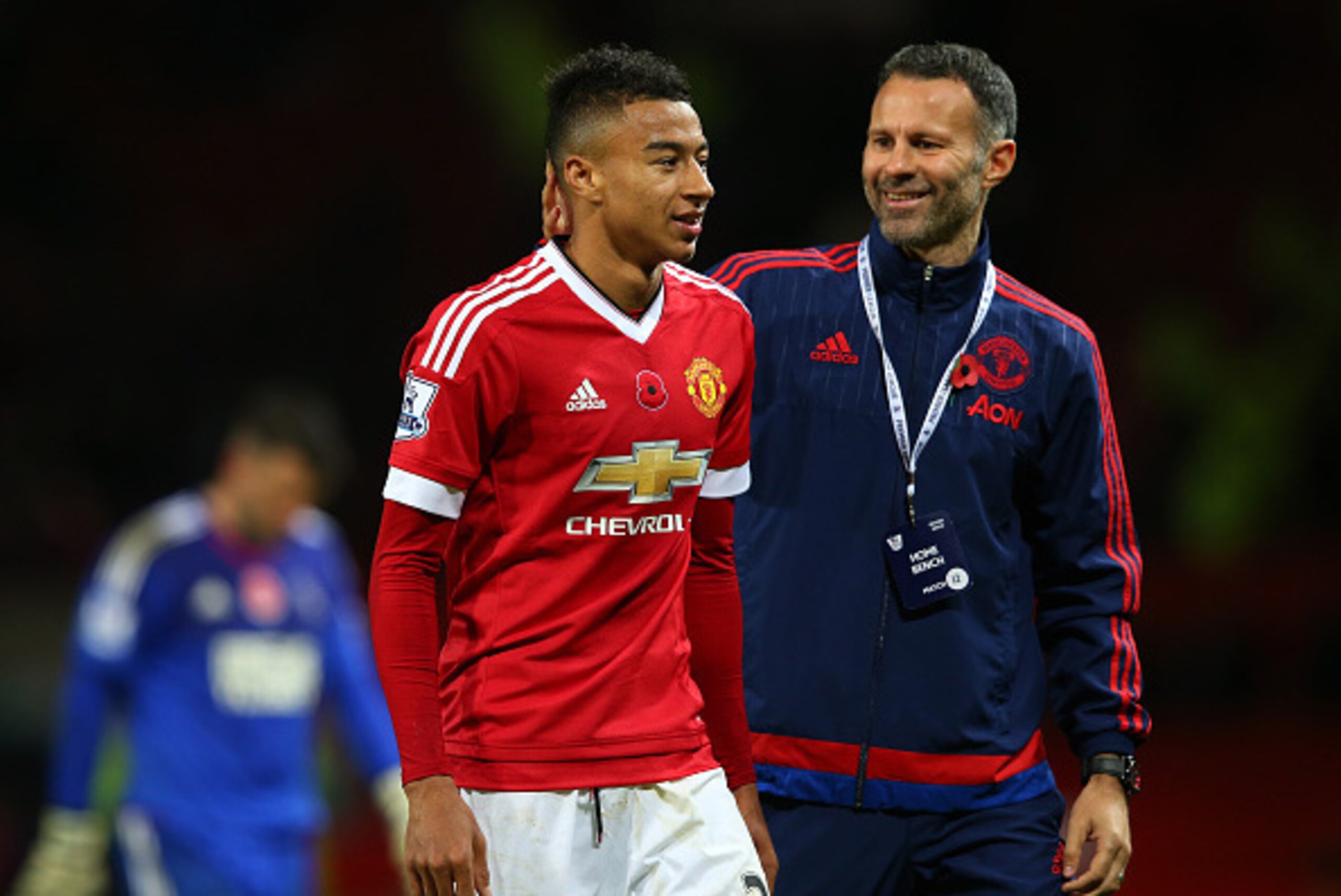 MANCHESTER, ENGLAND - NOVEMBER 07: Jesse Lingard (L) of Manchester United is congratulated by assistant manager Ryan Giggs (R) during the Barclays Premier League match between Manchester United and West Bromwich Albion at Old Trafford on November 7, 2015 