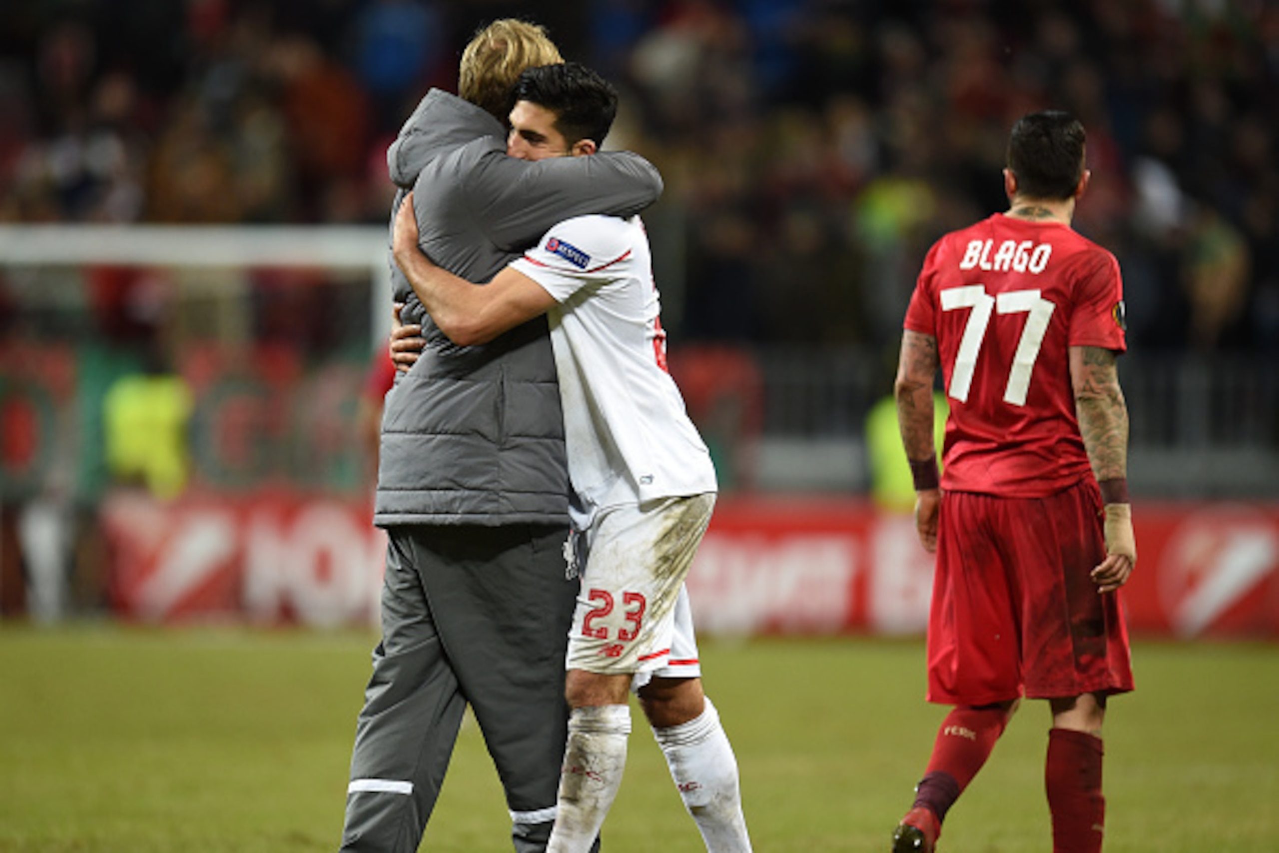 KAZAN, RUSSIA - NOVEMBER 05: Head coach Jurgen Klopp (L) and Emre Can of Liverpool FC celebrate after their victory over FC Rubin Kazan in the UEFA Europa League group B match between FC Rubin Kazan and Liverpool FC at the Kazan Arena Stadium on November 