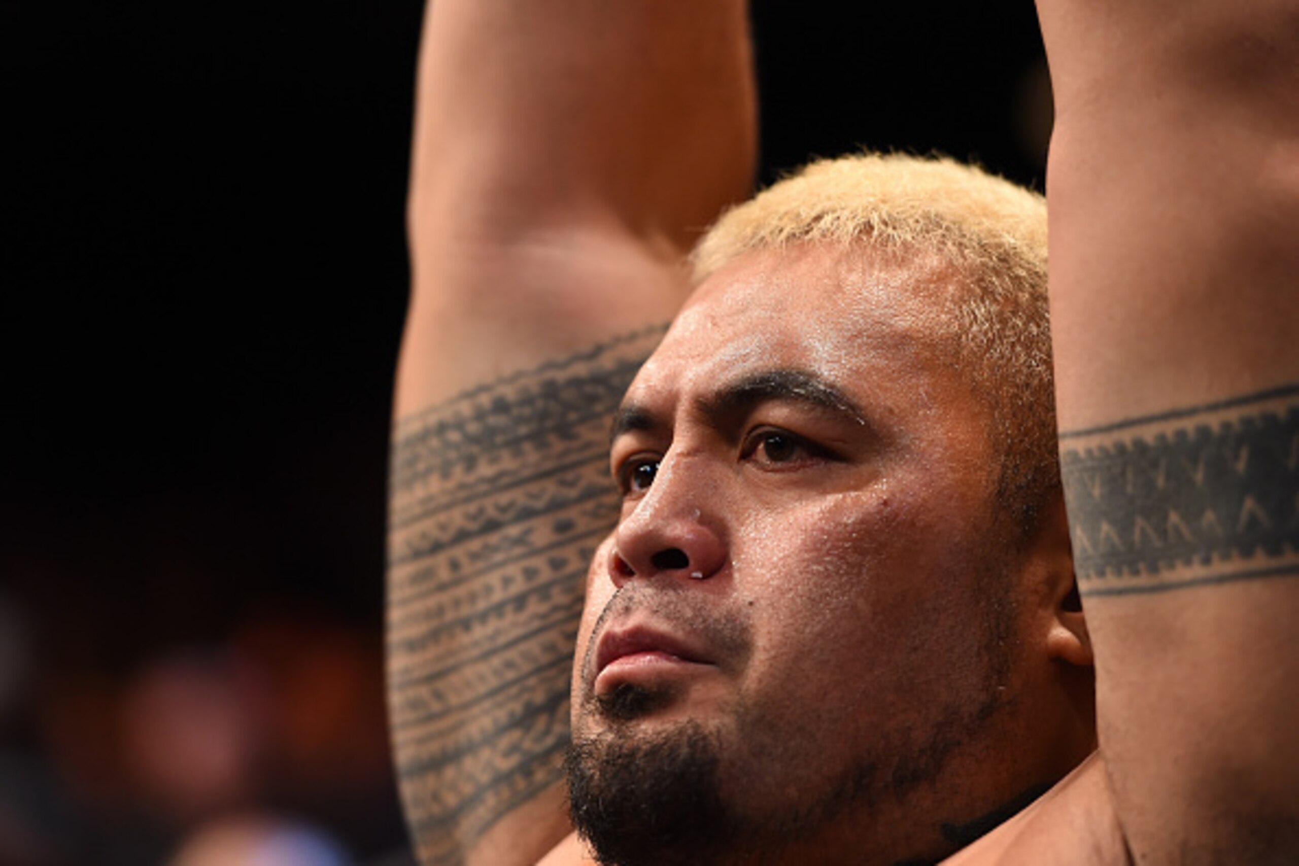 ADELAIDE, AUSTRALIA - MAY 10:   Mark Hunt  prepares to enter the Octagon before facing Stipe Miocic in their heavyweight bout during the UFC Fight Night event at the Adelaide Entertainment Centre on May 10, 2015 in Adelaide, Australia. (Photo by Josh Hedg