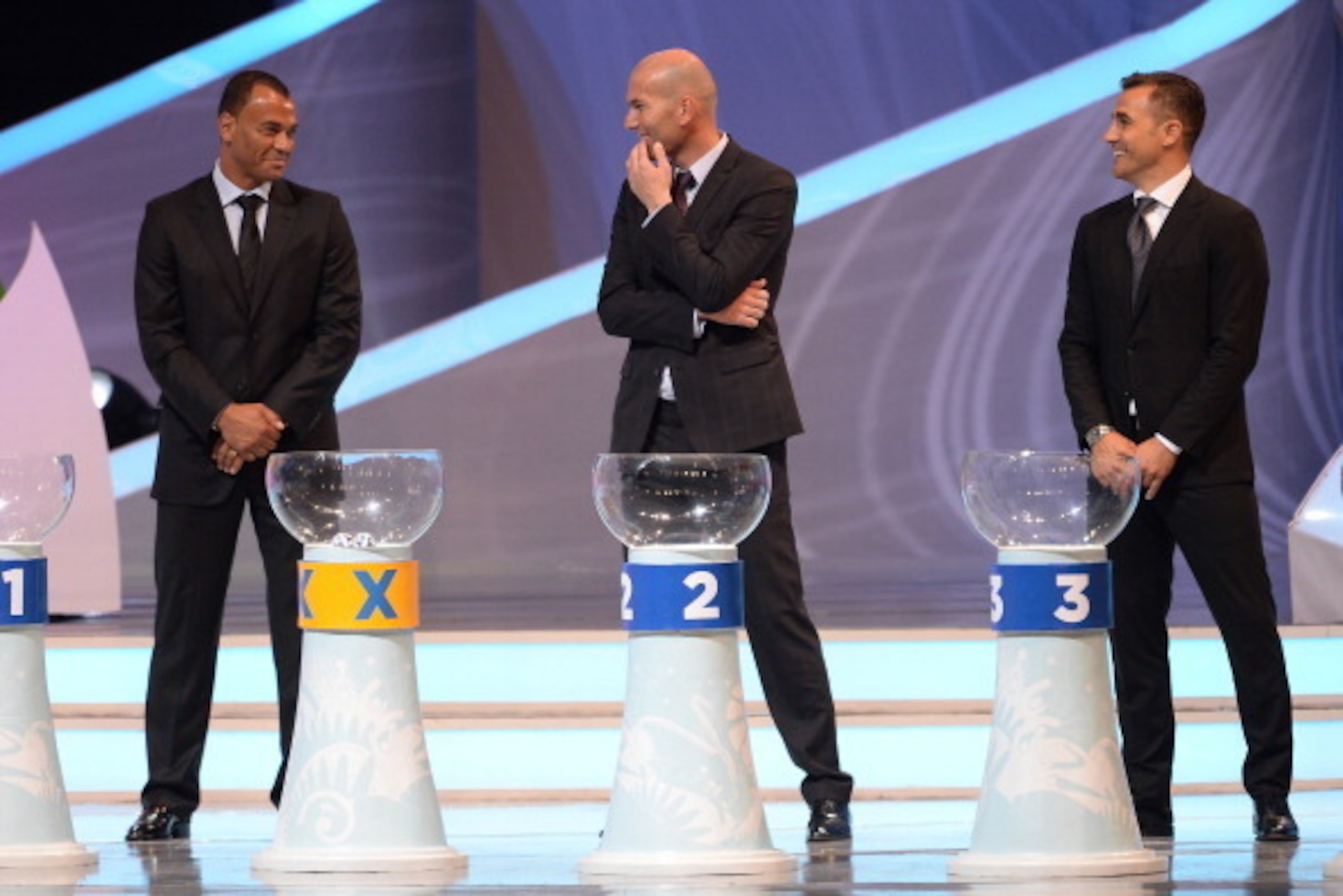 COSTA DO SAUIPE, BRAZIL - DECEMBER 06:  Draw assistants (L-R) Cafu, Zinedine Zidane and Fabio Cannavaro smile during the Final Draw for the 2014 FIFA World Cup Brazil at Costa do Sauipe Resort on December 6, 2013 in Costa do Sauipe, Bahia, Brazil.  (Photo
