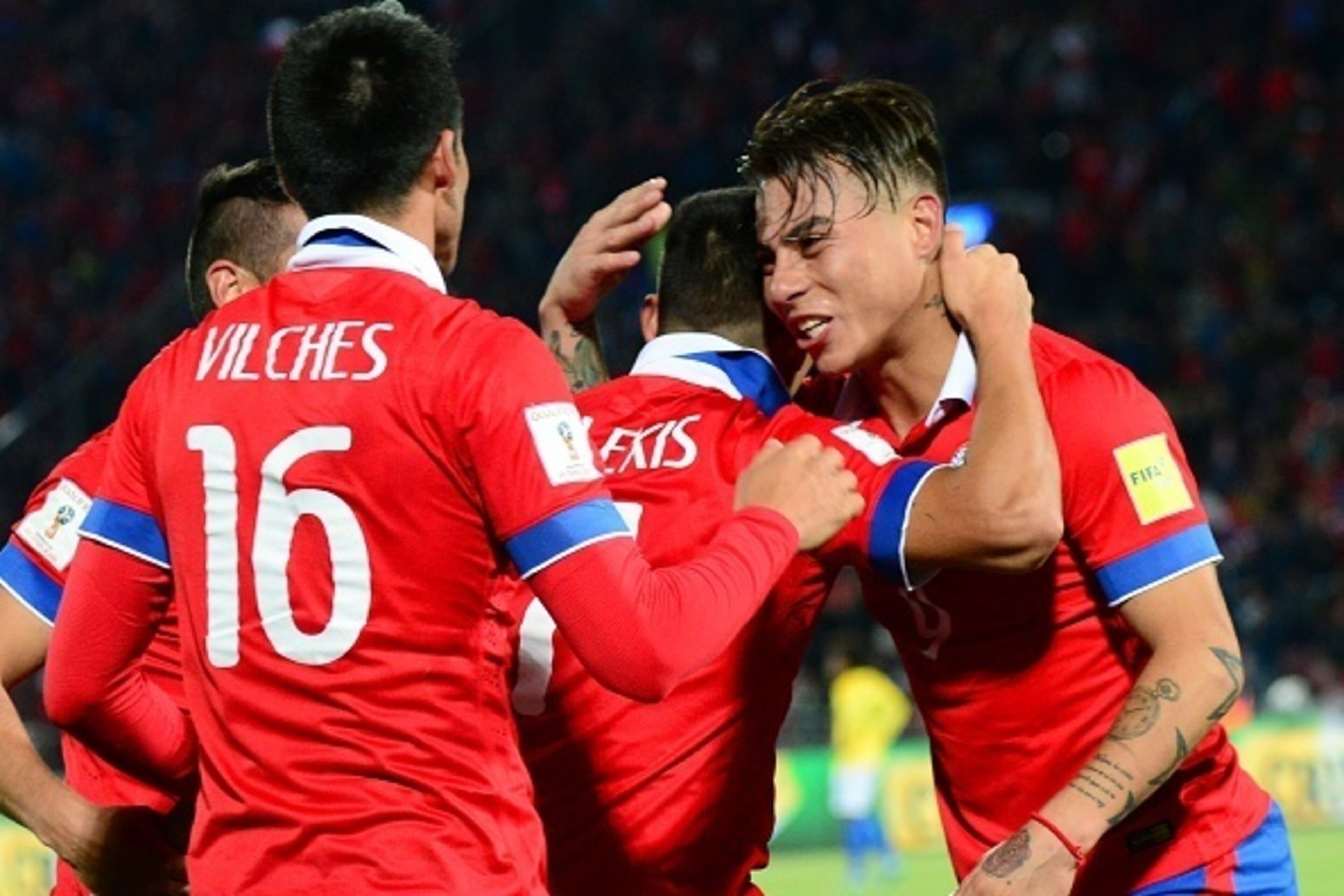 Chile's Eduardo Vargas (R), Alexis Sanchez (C) and Cristian Vilches celebrates at the end of their Russia 2018 FIFA World Cup qualifiers match against Brazil, at the Nacional stadium in Santiago de Chile, on October 8, 2015. AFP PHOTO / MARTIN BERNETTI Chile's Eduardo Vargas (R), Alexis Sanchez (C) and Cristian Vilches celebrates at the end of their Russia 2018 FIFA World Cup qualifiers match against Brazil, at the Nacional stadium in Santiago de Chile, on October 8, 2015. AFP PHOTO / MARTIN BERNETTI