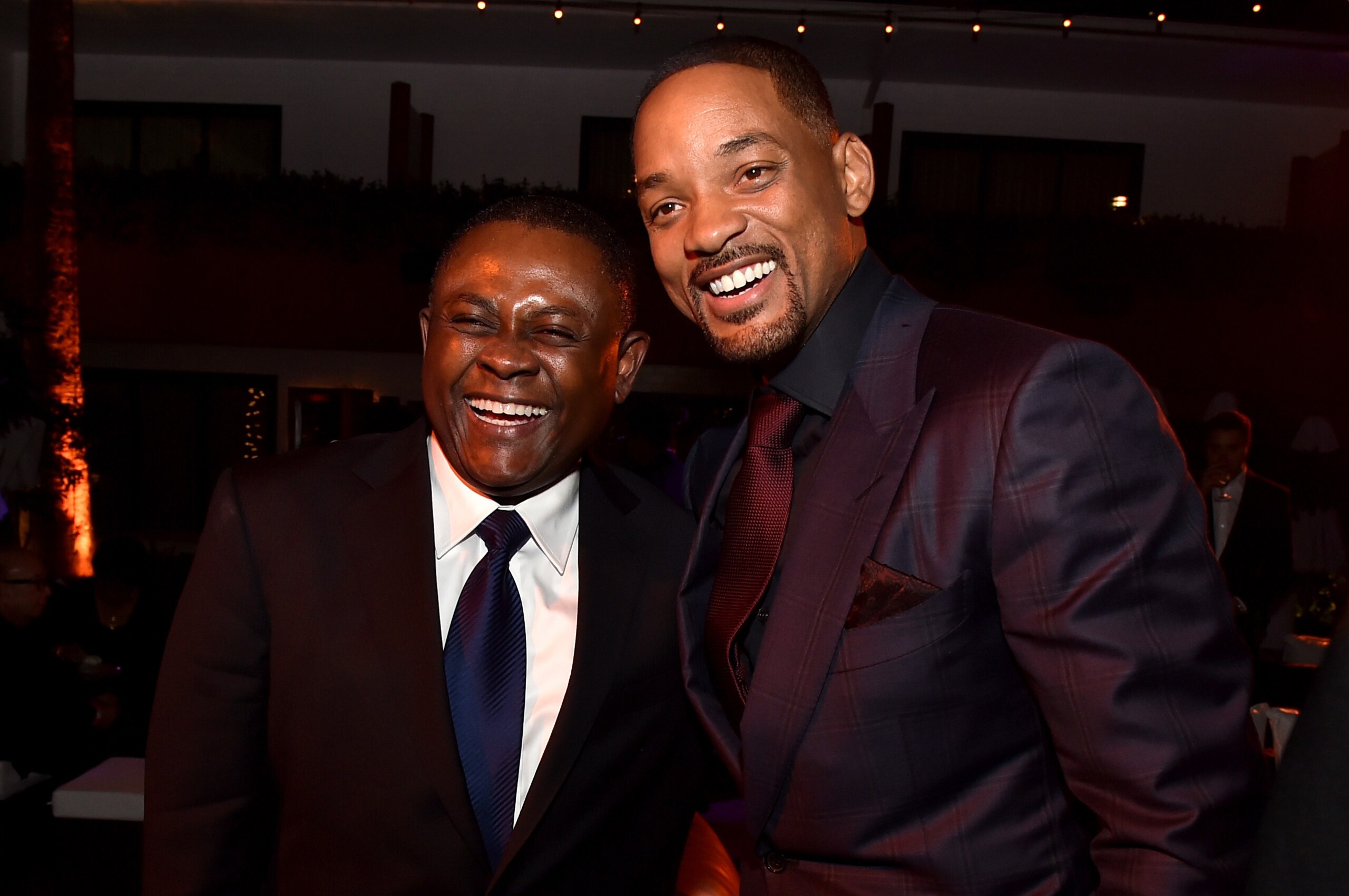 HOLLYWOOD, CA - NOVEMBER 10:  Dr. Bennet Omalu (L) and actor Will Smith attend the after party for the Centerpiece Gala Premiere of Columbia Pictures' 'Concussion' during AFI FEST 2015 presented by Audi at TCL Chinese Theatre on November 10, 2015 in Holly