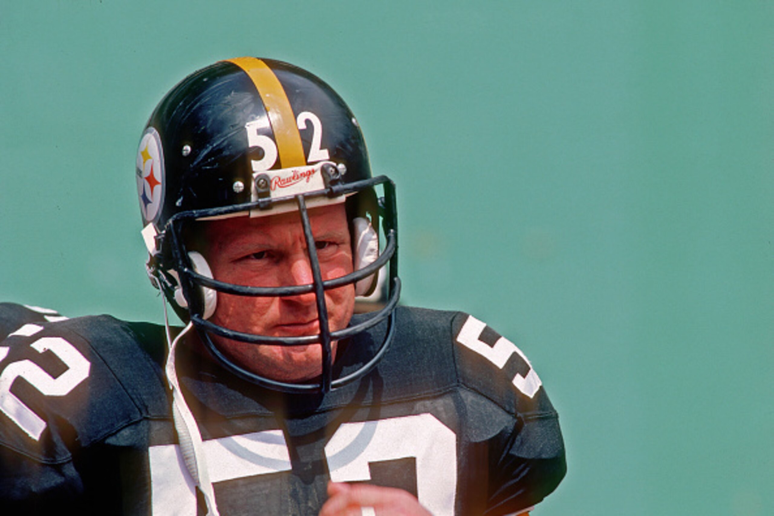 PITTSBURGH, PA - SEPTEMBER 6:  Center Mike Webster #52 of the Pittsburgh Steelers looks on from the sideline before a game against the Kansas City Chiefs at Three Rivers Stadium on September 6, 1981 in Pittsburgh, Pennsylvania.  The Chiefs defeated the St