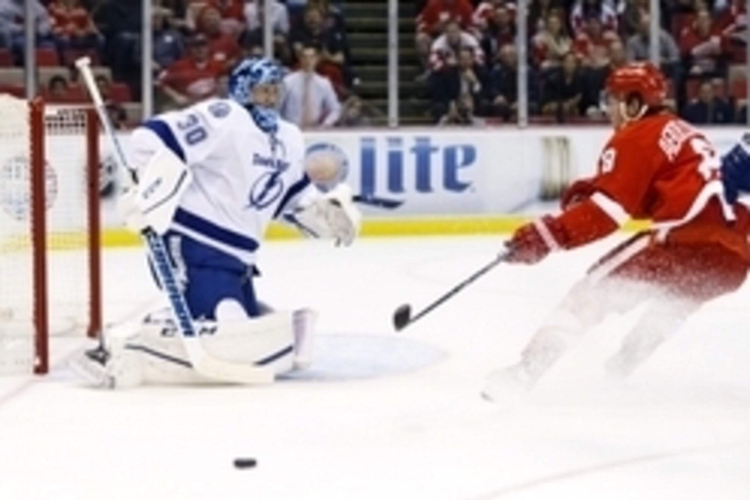 Nov 3, 2015; Detroit, MI, USA; Tampa Bay Lightning goalie Ben Bishop (30) makes the save on Detroit Red Wings left wing Justin Abdelkader (8) in the first period at Joe Louis Arena. Mandatory Credit: Rick Osentoski-USA TODAY Sports