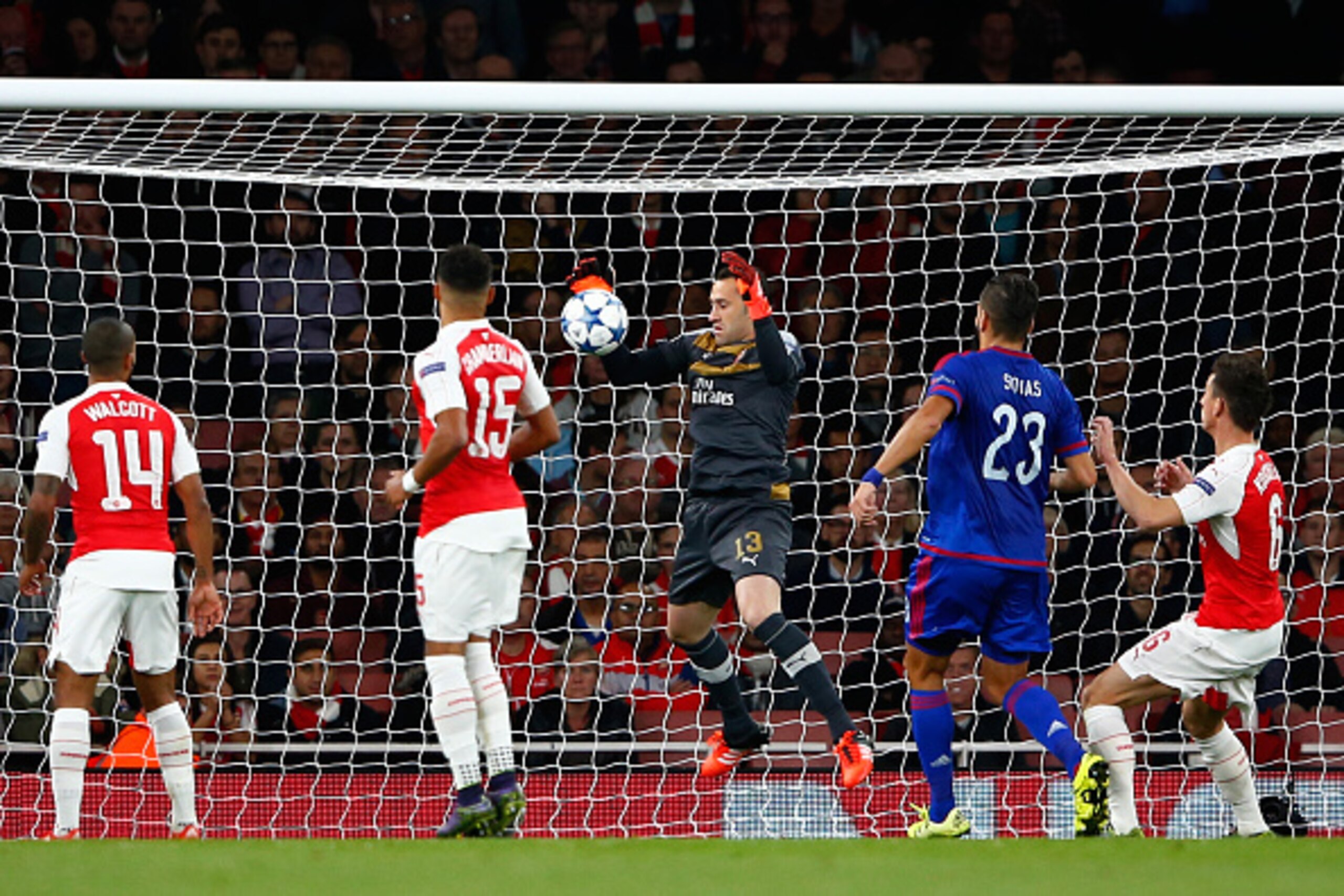 LONDON, ENGLAND - SEPTEMBER 29:  David Ospina of Arsenal scores an own goal during the UEFA Champions League Group F match between Arsenal FC and Olympiacos FC at the Emirates Stadium on September 29, 2015 in London, United Kingdom.  (Photo by Shaun Botte