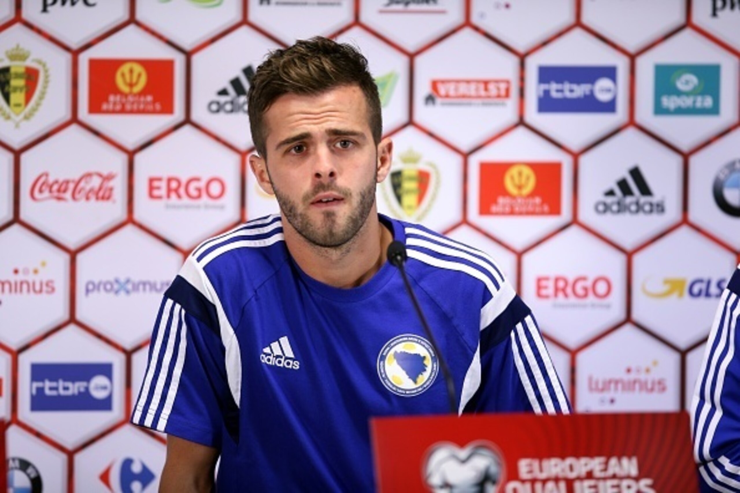 Bosnian midfielder Miralem Pjanic attends a press conference on September 2, 2015 at Brussels' King Baudouin stadium on the eve of the team's Euro 2016 qualifying Group B football match against Belgium's Red Devils. AFP PHOTO / BELGA PHOTO / BRUNO FAHY 
*