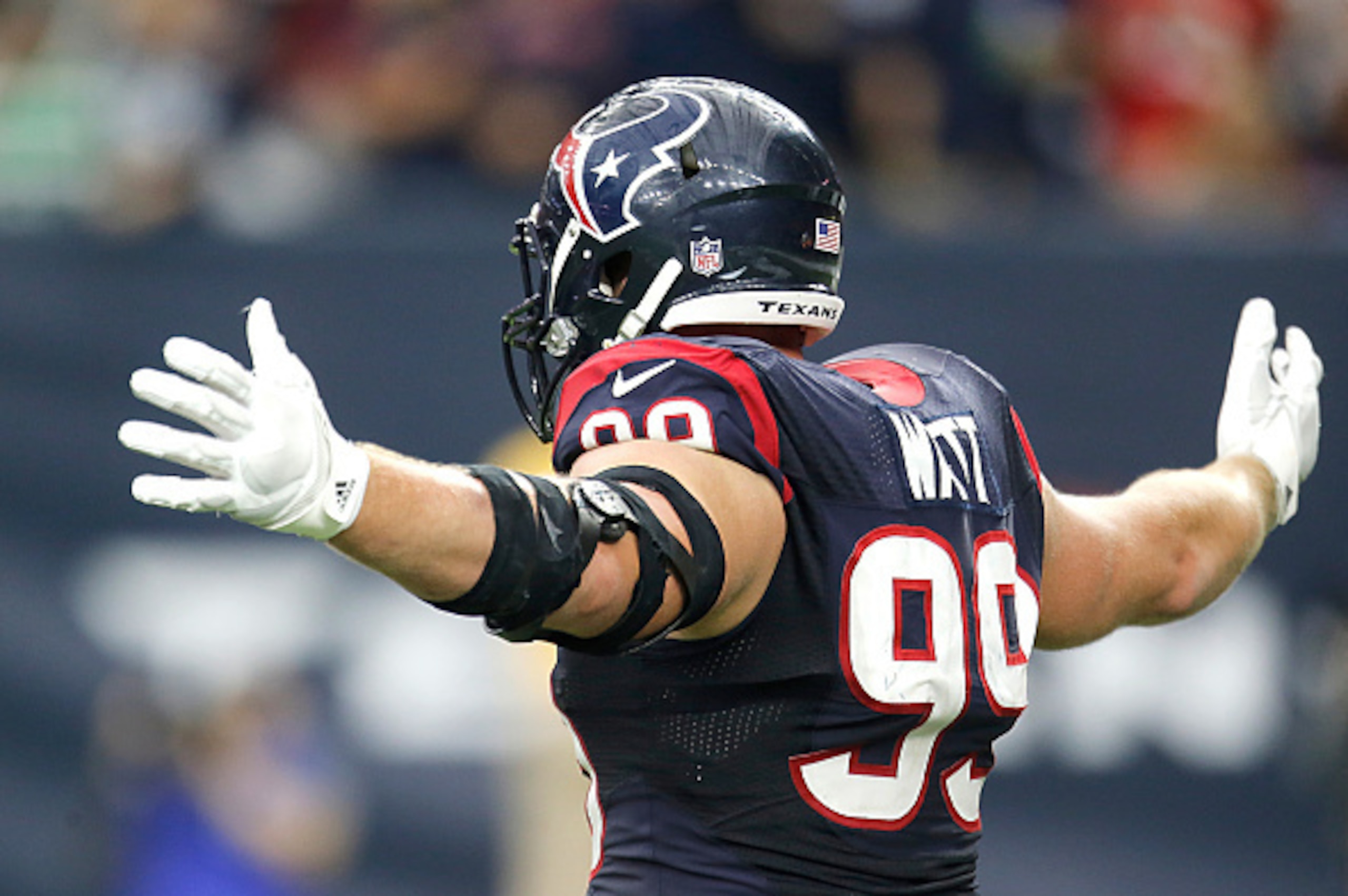 HOUSTON, TX - NOVEMBER 01: J.J. Watt #99 of the Houston Texans celebrates a sack against the Tennessee Titans on November 1, 2015 at NRG Stadium in Houston, Texas. Texans won 20 to 6.(Photo by Thomas B. Shea/Getty Images)