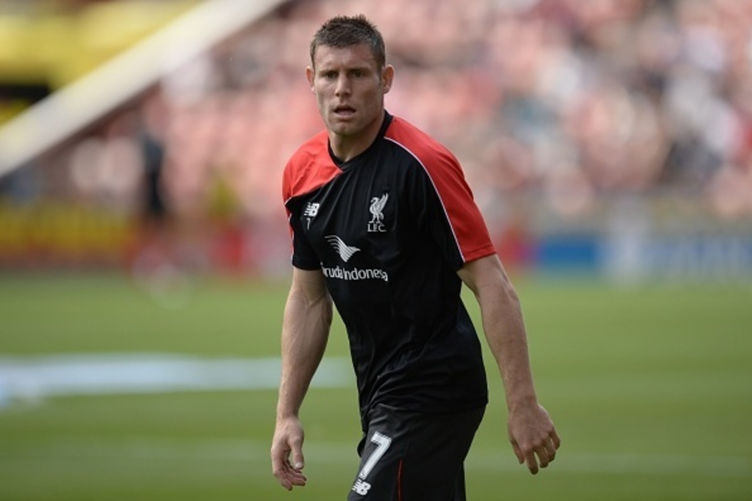 Liverpool's English midfielder James Milner warms up ahead of the English Premier League football match between Stoke City and Liverpool at the Britannia Stadium in Stoke-on-Trent, central England on August 9, 2015. AFP PHOTO / OLI SCARFF
RESTRICTED TO E Liverpool's English midfielder James Milner warms up ahead of the English Premier League football match between Stoke City and Liverpool at the Britannia Stadium in Stoke-on-Trent, central England on August 9, 2015. AFP PHOTO / OLI SCARFF
RESTRICTED TO E