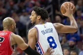 Nov 9, 2015; Philadelphia, PA, USA; Philadelphia 76ers center Jahlil Okafor (8) palms the ball as he looks for an opening past Chicago Bulls forward Taj Gibson (22) during the second quarter at Wells Fargo Center. Mandatory Credit: Bill Streicher-USA TODA