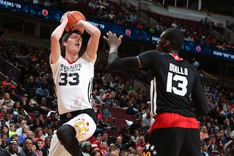 Apr 1, 2015; Chicago, IL, USA;  McDonalds High School All American West boys center Stephen Zimmerman Jr. (33) takes a shot against East center Cheick Diallo (13) during the McDonalds High School All American Games at the United Center. Mandatory Credit: