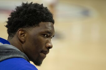 PHILADELPHIA, PA - NOVEMBER 11: Joel Embiid #21 of the Philadelphia 76ers looks on from the bench prior to a game agianst the Toronto Raptors on November 11, 2015 at the Wells Fargo Center in Philadelphia, Pennsylvania. NOTE TO USER: User expressly acknow