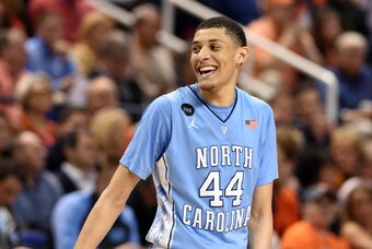 Mar 13, 2015; Greensboro, NC, USA; North Carolina Tar Heels guard/forward Justin Jackson (44) celebrates during game against the Virginia Cavaliers in the second half during the semifinals of the ACC Tournament at Greensboro Coliseum. The North Carolina T