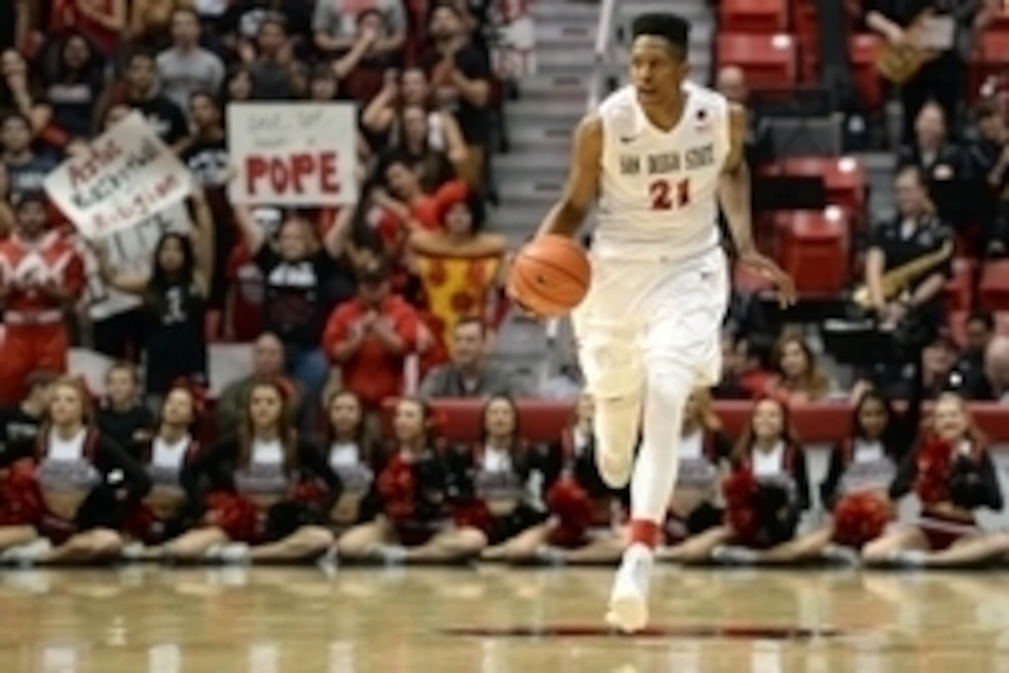 Jan 31, 2015; San Diego, CA, USA; San Diego State Aztecs forward Malik Pope (21) brings the ball up during the second half against the Utah State Aggies at Viejas Arena at Aztec Bowl. Mandatory Credit: Jake Roth-USA TODAY Sports