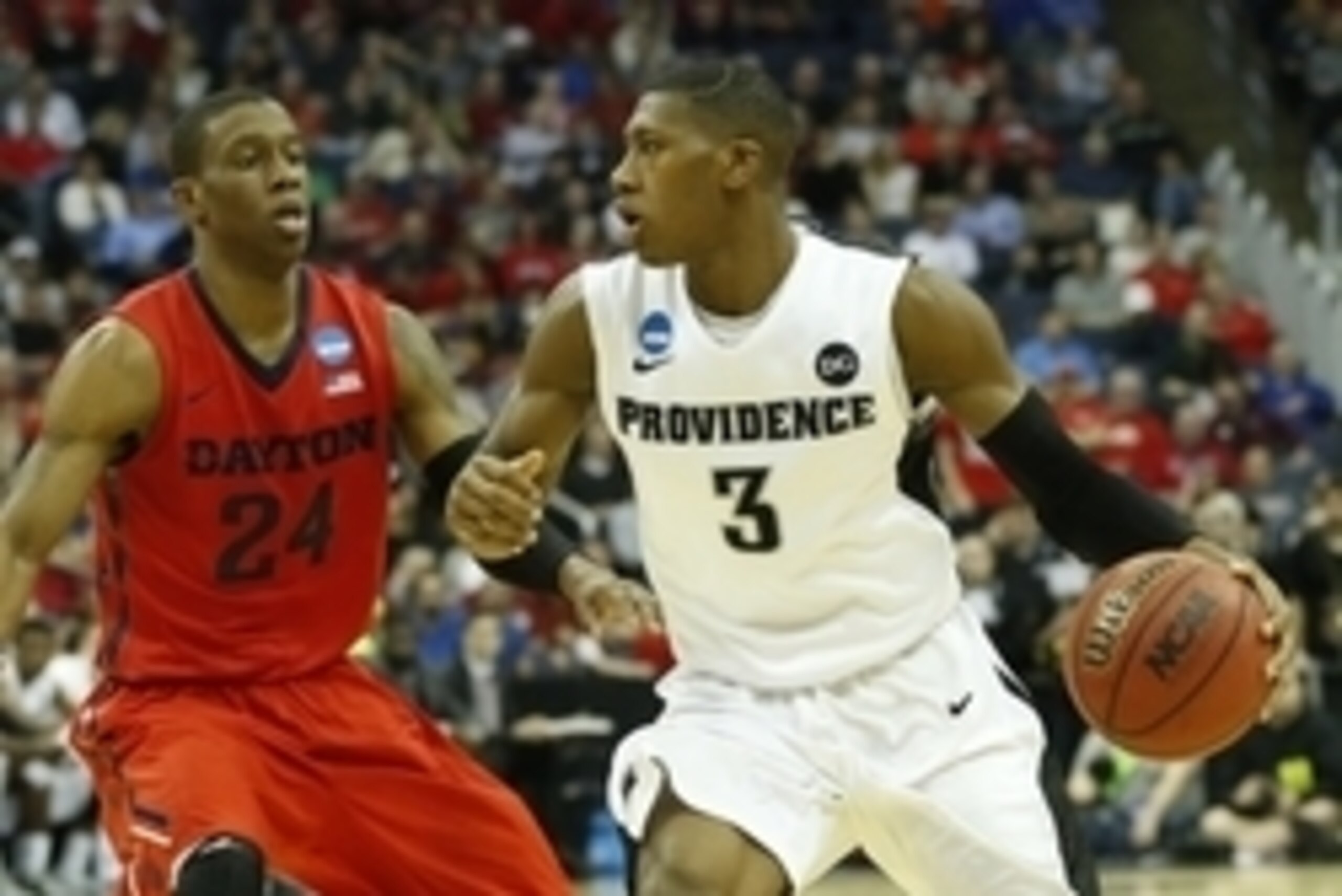 Mar 20, 2015; Columbus, OH, USA; Providence Friars guard Kris Dunn (3) dribbles while guarded by Dayton Flyers guard Jordan Sibert (24) during the first half in the second round of the 2015 NCAA Tournament at Nationwide Arena. Mandatory Credit: Greg Bartr