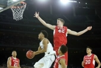 Mar 27, 2015; Houston, TX, USA; Duke Blue Devils guard Quinn Cook (2) shoots against Utah Utes forward Jakob Poeltl (42) during the second half in the semifinals of the south regional of the 2015 NCAA Tournament at NRG Stadium. Mandatory Credit: Troy Taor