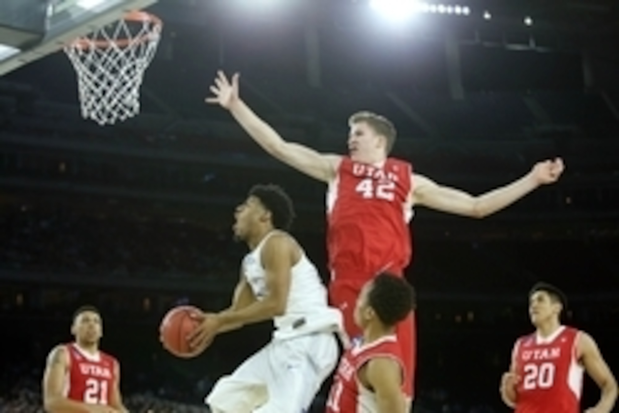 Mar 27, 2015; Houston, TX, USA; Duke Blue Devils guard Quinn Cook (2) shoots against Utah Utes forward Jakob Poeltl (42) during the second half in the semifinals of the south regional of the 2015 NCAA Tournament at NRG Stadium. Mandatory Credit: Troy Taor