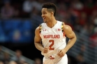 Mar 14, 2015; Chicago, IL, USA; Maryland Terrapins guard Melo Trimble (2) reacts after making a three-pointer against the Michigan State Spartans  during the first half in the semifinals of the Big Ten Tournament at United Center. Mandatory Credit: Jerry 
