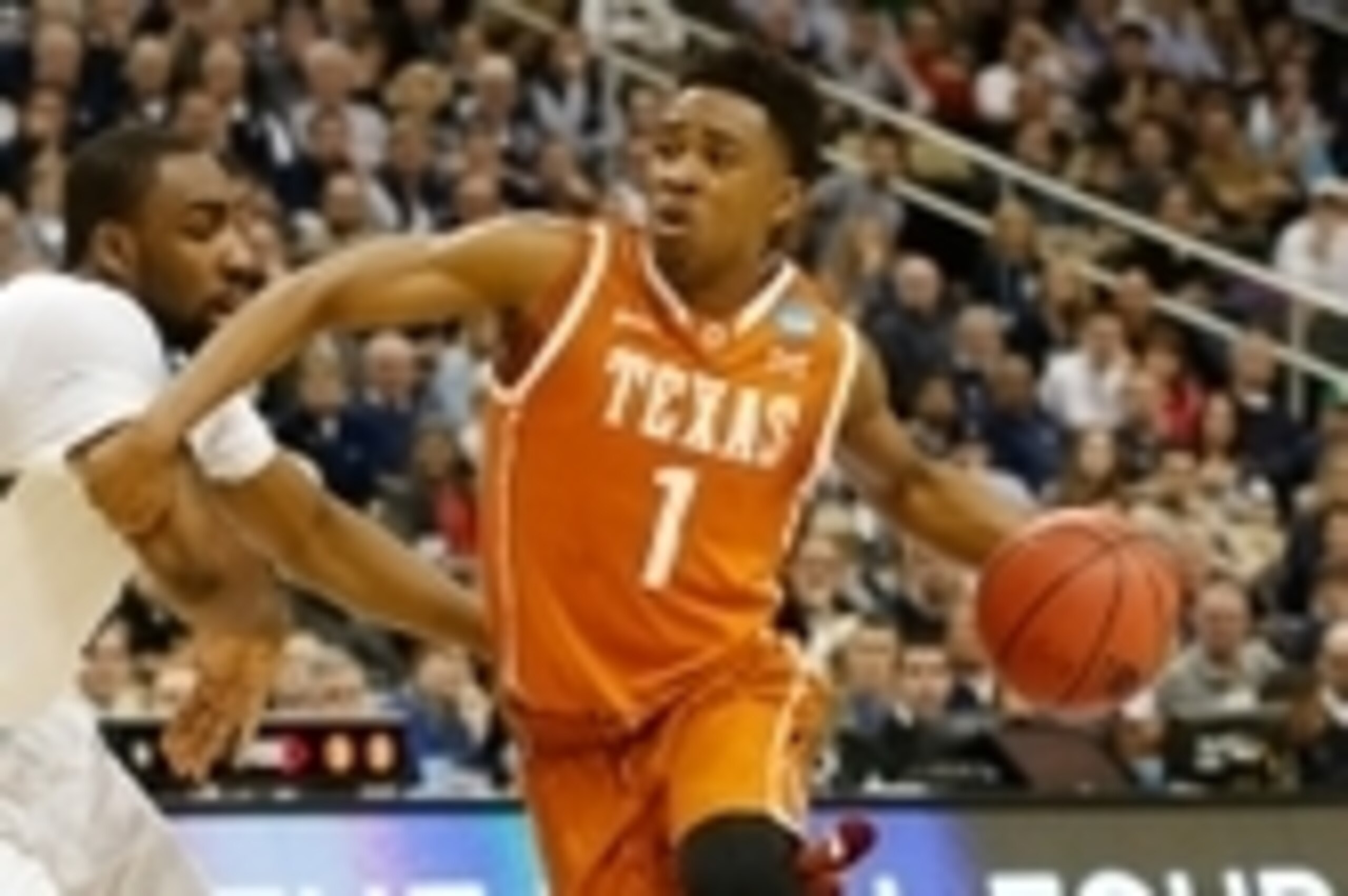Mar 19, 2015; Pittsburgh, PA, USA; Texas Longhorns guard Isaiah Taylor (1) dribbles the ball against the Butler Bulldogs in the second round of the 2015 NCAA Tournament at Consol Energy Center. Mandatory Credit: Geoff Burke-USA TODAY Sports
