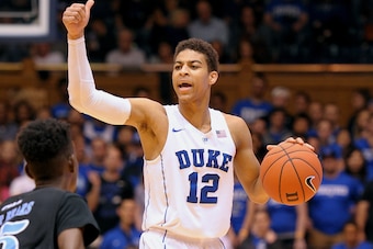 DURHAM, NC - NOVEMBER 04: Derryck Thornton #12 of the Duke Blue Devils calls a play against the Livingstone Blue Bears at Cameron Indoor Stadium on November 4, 2015 in Durham, North Carolina. Duke defeated Livingstone 119-54. (Photo by Lance King/Getty Im