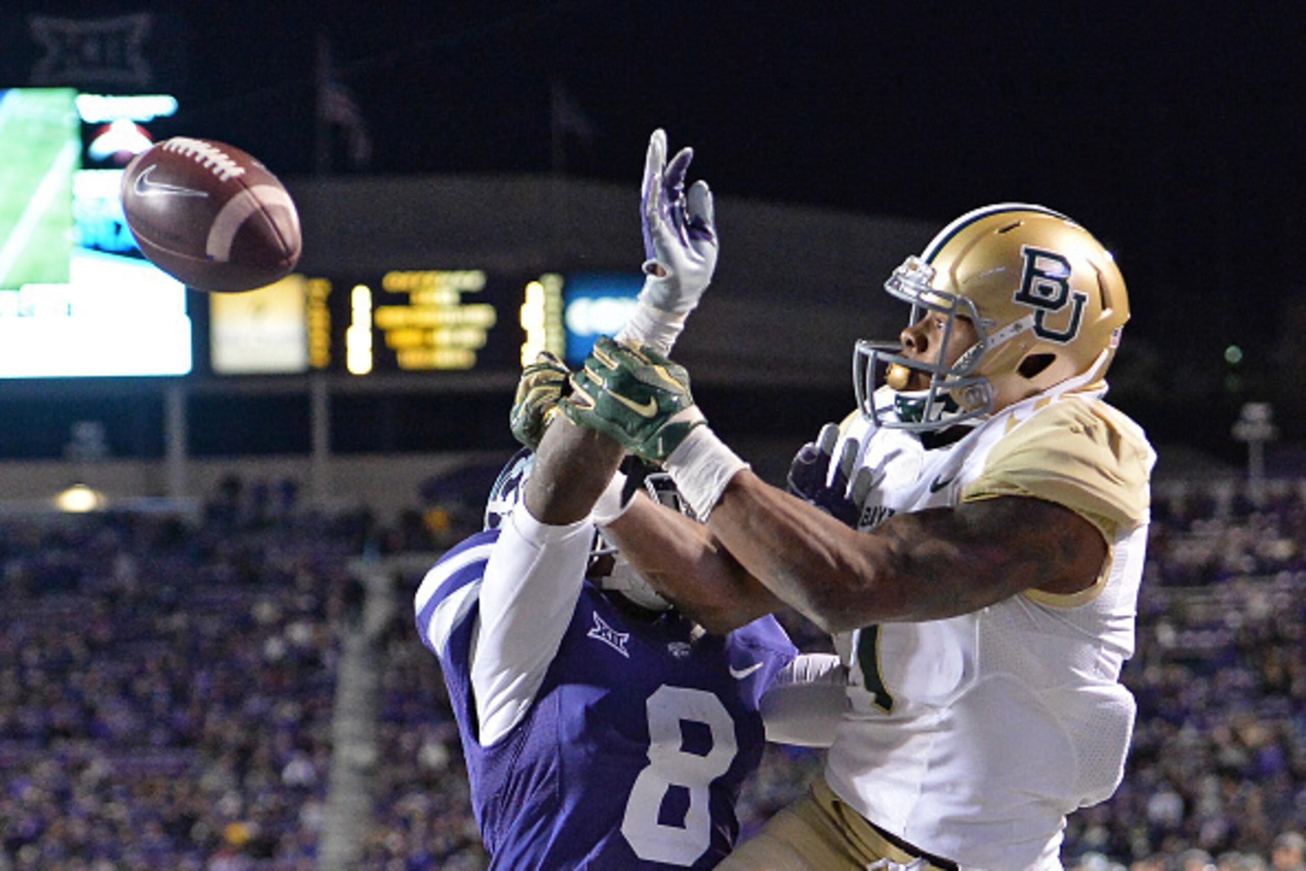 MANHATTAN, KS - NOVEMBER 05:  Defensive back Duke Shelley #8 of the Kansas State Wildcats brakes up a pass in the end zone intended for wide receiver Corey Coleman #1 of the Baylor Bears during the second half on November 5, 2015 at Bill Snyder Family Sta