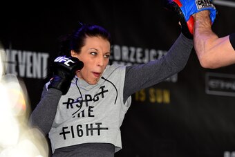MELBOURNE, AUSTRALIA - NOVEMBER 12:  UFC women's strawweight champion Joanna Jedrzejczyk of Poland holds an open workout for fans and media at Federation Square on November 12, 2015 in Melbourne, Australia. (Photo by Josh Hedges/Zuffa LLC/Zuffa LLC via Ge