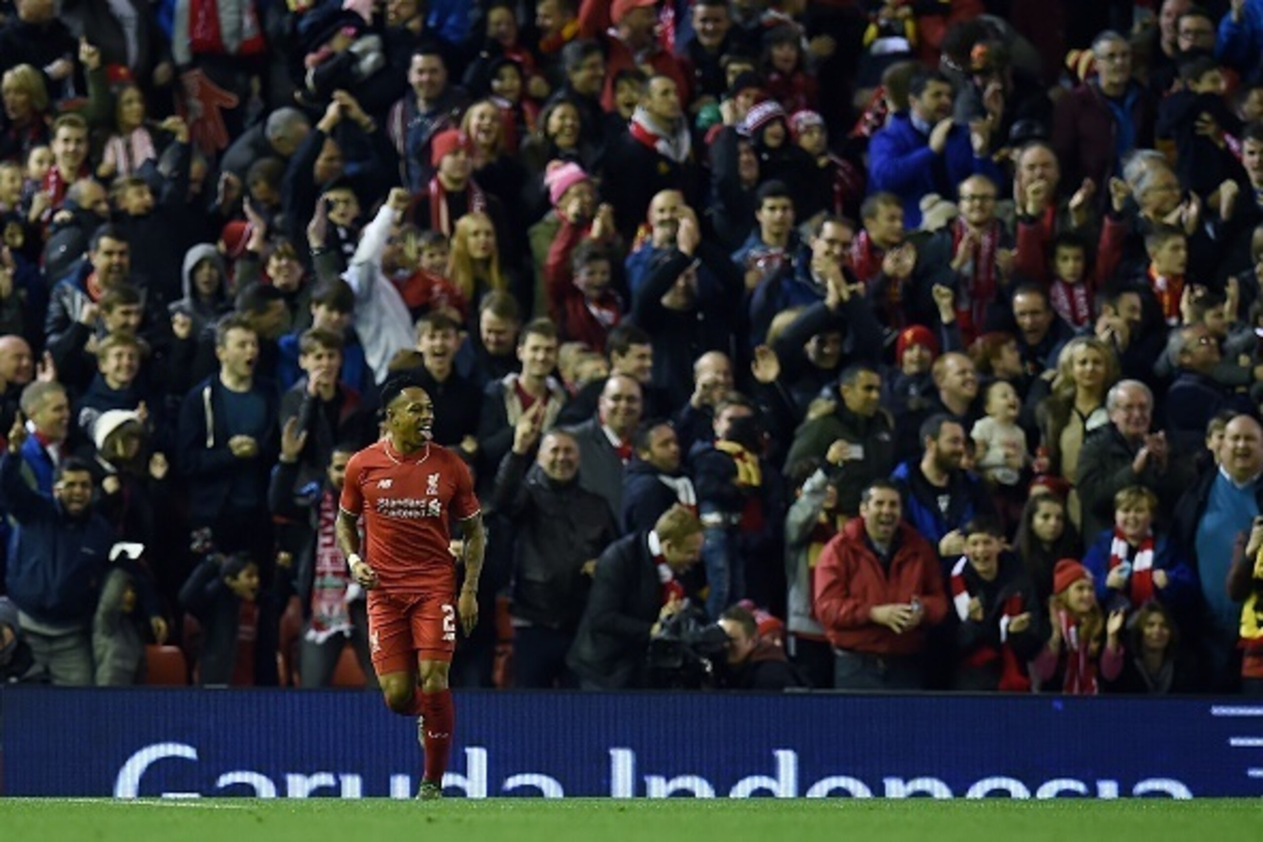 Liverpool's English defender Nathaniel Clyne scoring his team's first goal during the English League Cup fourth round football match between Liverpool and Bournemouth at Anfield stadium in Liverpool, north west England on October 28, 2015. AFP PHOTO / PAU