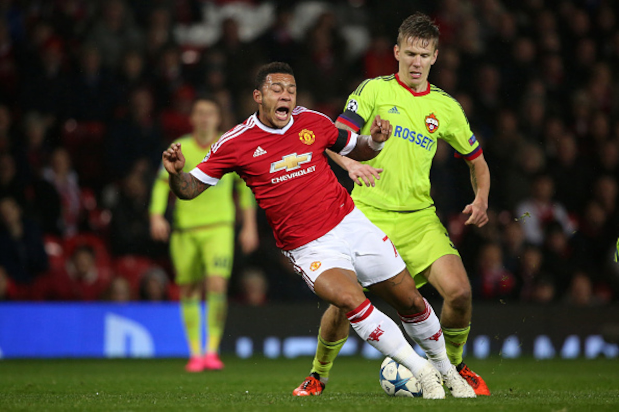 MANCHESTER, UNITED KINGDOM - NOVEMBER 03:  Memphis Depay of Manchester United and Pontus Wernbloom of CSKA Moscow during the UEFA Champions League match between Manchester United and PFC CSKA Moskva on November 3, 2015 in Manchester, United Kingdom.  (Pho