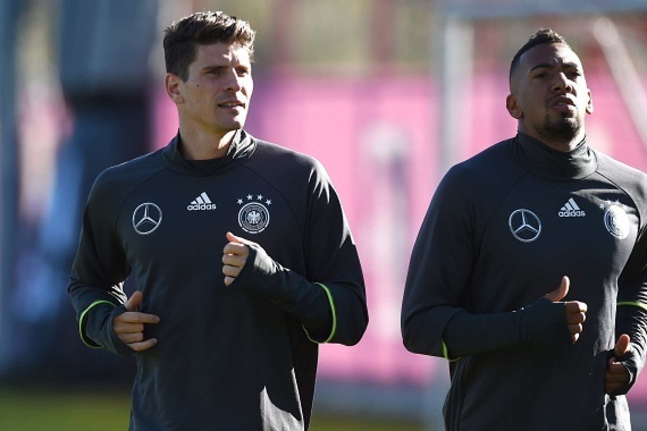 Germany's striker Mario Gomez (L) and Germany's defender Jerome Boateng attend a training session of the German national football team in Munich, southern Germany, on November 11, 2015. Germany's team trains for a friendly football match between France an