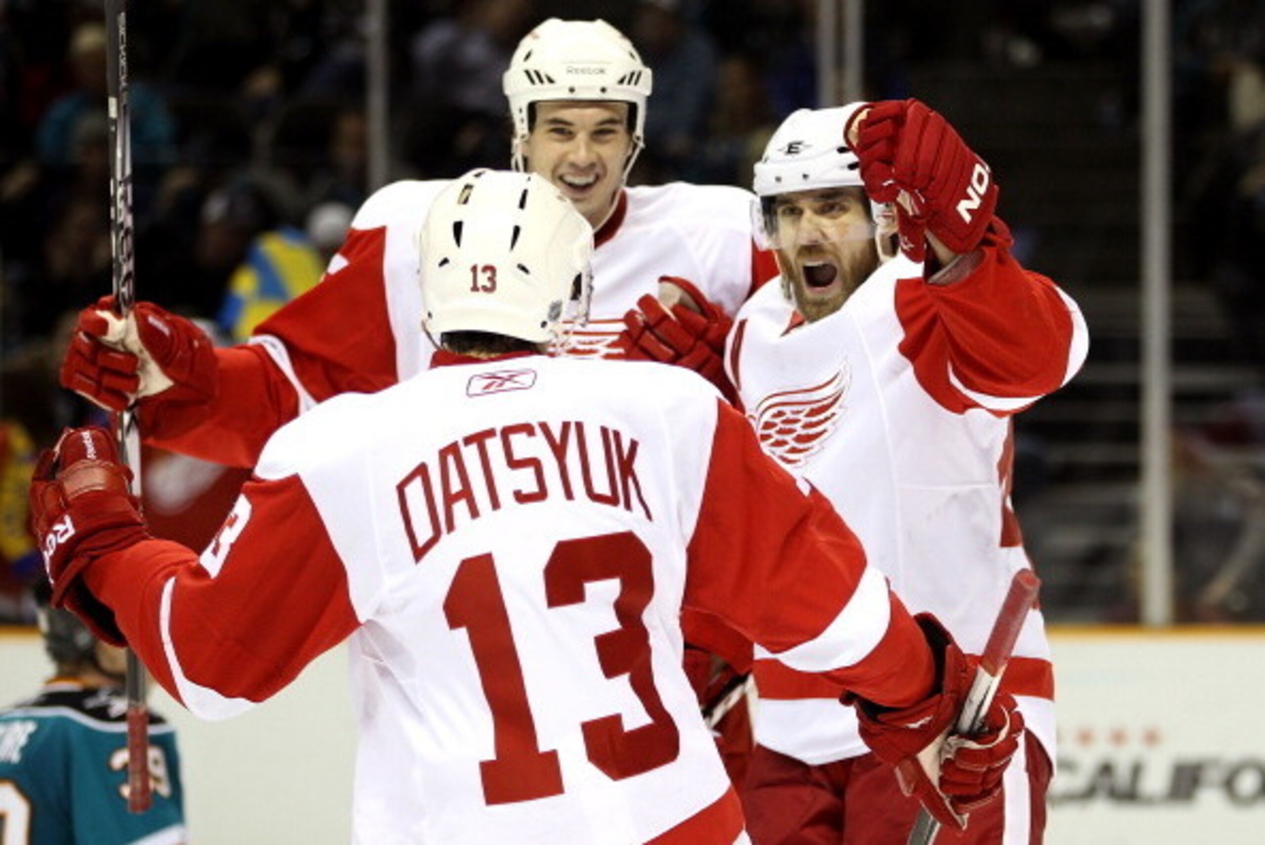 SAN JOSE, CA - NOVEMBER 30: Henrik Zetterberg #40 celebrates with Pavel Datsyuk #13 and Jonathan Ericsson #52 of the Detroit Red Wings after Zetterberg scored a goal against the San Jose Sharks at HP Pavilion on November 30, 2010 in San Jose, California. SAN JOSE, CA - NOVEMBER 30: Henrik Zetterberg #40 celebrates with Pavel Datsyuk #13 and Jonathan Ericsson #52 of the Detroit Red Wings after Zetterberg scored a goal against the San Jose Sharks at HP Pavilion on November 30, 2010 in San Jose, California.