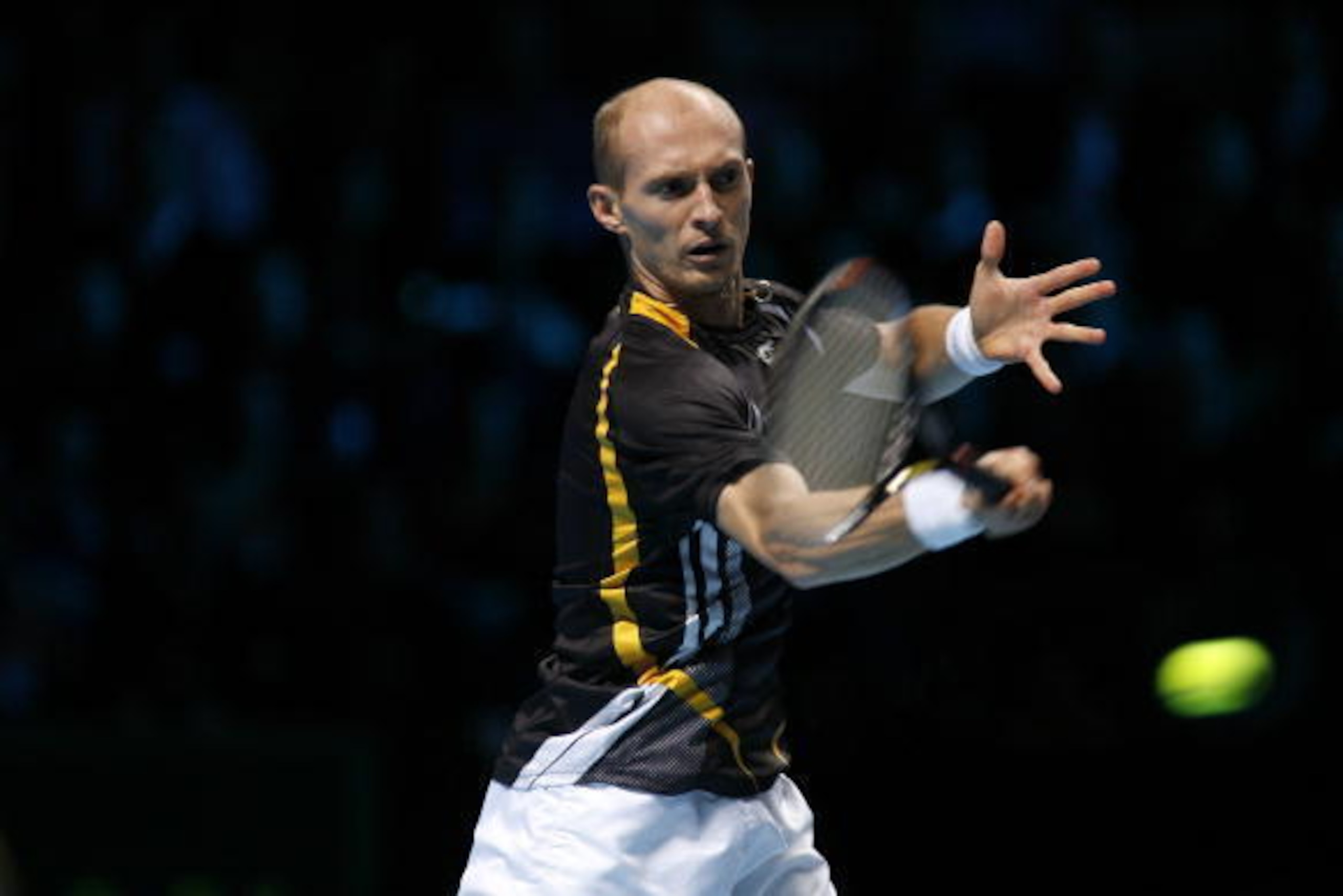 Nikolay Davydenko of Russia plays against Rafael Nadal of Spain in a Singles match during the Barclays ATP World Tour Tennis Finals in London, on November 25, 2009. AFP PHOTO/GLYN KIRK (Photo credit should read GLYN KIRK/AFP/Getty Images) Nikolay Davydenko of Russia plays against Rafael Nadal of Spain in a Singles match during the Barclays ATP World Tour Tennis Finals in London, on November 25, 2009. AFP PHOTO/GLYN KIRK (Photo credit should read GLYN KIRK/AFP/Getty Images)
