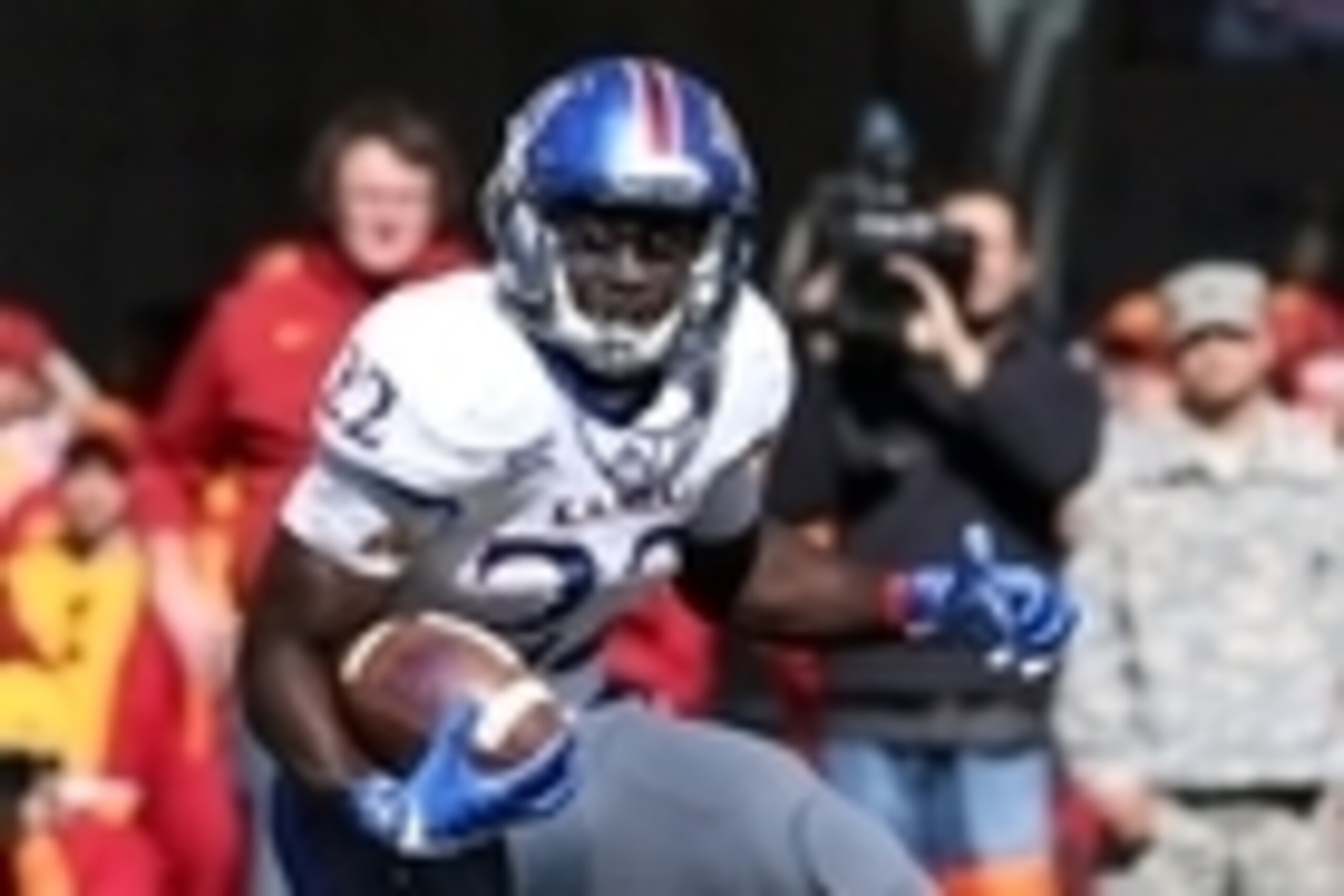 Oct 3, 2015; Ames, IA, USA; Kansas Jayhawks running back Ke'aun Kinner (22) runs for a first down against the Iowa State Cyclones at Jack Trice Stadium. Mandatory Credit: Reese Strickland-USA TODAY Sports Oct 3, 2015; Ames, IA, USA; Kansas Jayhawks running back Ke'aun Kinner (22) runs for a first down against the Iowa State Cyclones at Jack Trice Stadium. Mandatory Credit: Reese Strickland-USA TODAY Sports
