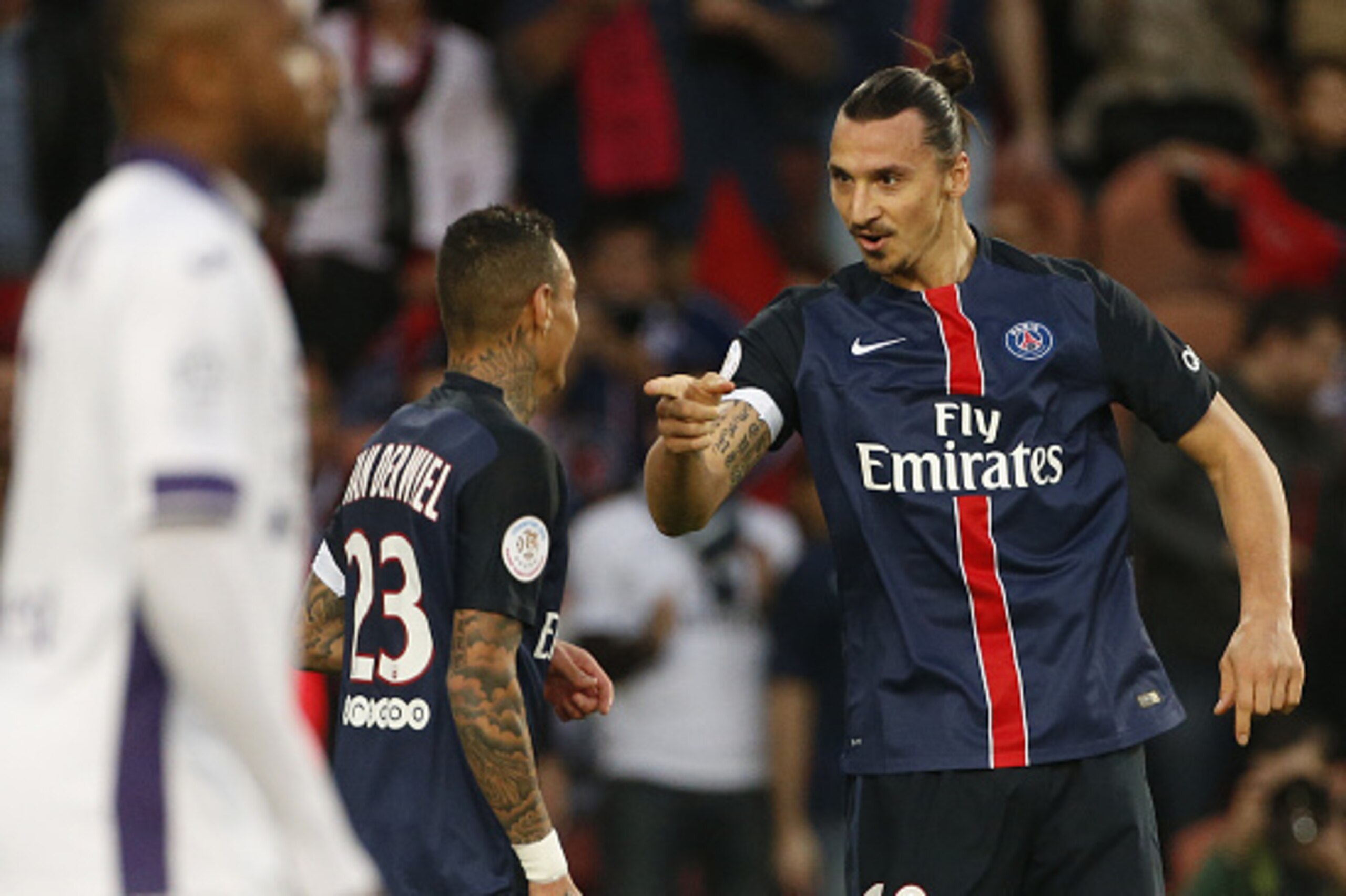 LYON, FRANCE - NOVEMBER 8: Zlatan Ibrahimovic of PSG celebrates his first goal with Gregory Van Der Wiel of PSG (left) during the French Ligue 1 match between Olympique Lyonnais (OL) and AS Saint-Etienne (ASSE) at Stade de Gerland on November 8, 2015 in L