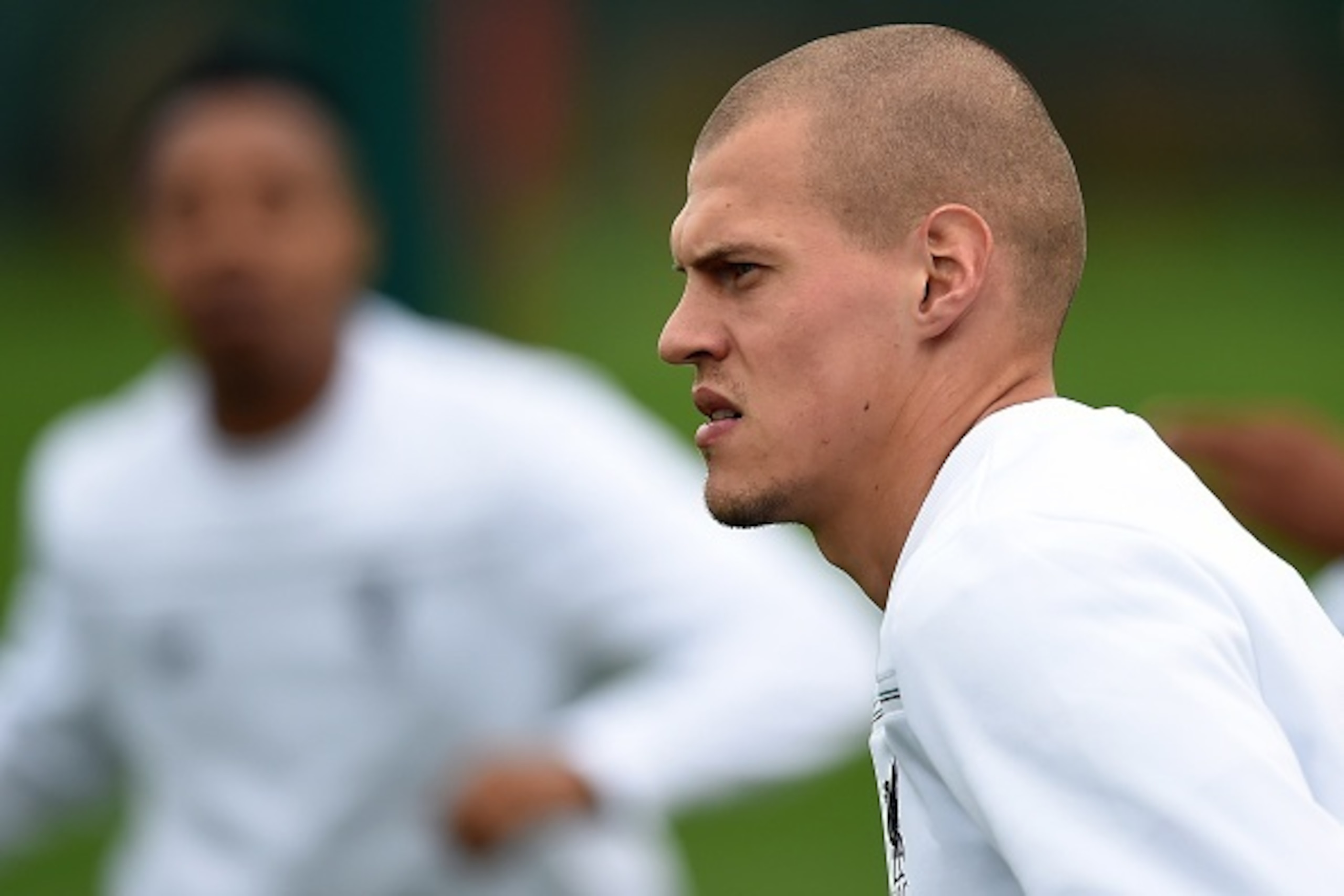 Liverpool's Slovakian defender Martin Skrtel stretches during a team training session in Liverpool, northwest England, on October 21, 2015, on the eve of their UEFA Europa League group B football match against Rubin Kazan. AFP PHOTO / PAUL ELLIS        (P