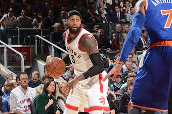 TORONTO, CA - NOVEMBER 10: James Johnson #3 of the Toronto Raptors drives to the basket against the New York Knicks during the game on November 10, 2015 at Air Canada Centre in Toronto, Canada. NOTE TO USER: User expressly acknowledges and agrees that, by