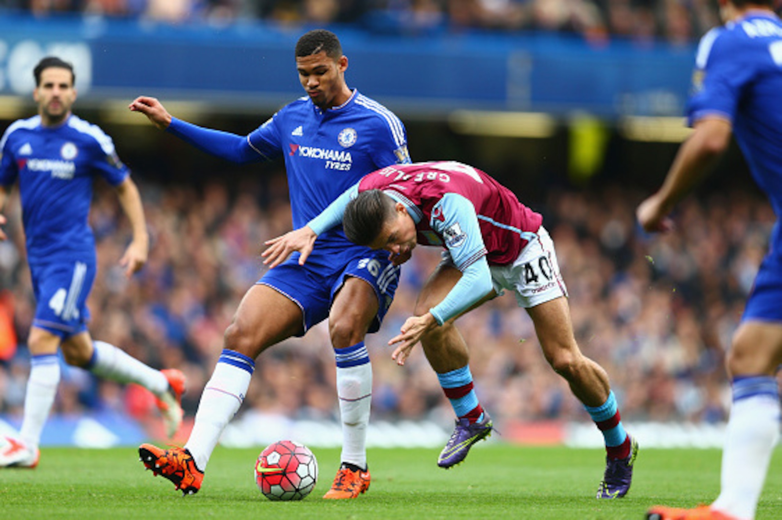 LONDON, ENGLAND - OCTOBER 17: Jack Grealish of Aston Villa and Ruben Loftus-Cheek of Chelsea compete for the ball during the Barclays Premier League match between Chelsea and Aston Villa at Stamford Bridge on October 17, 2015 in London, England.  (Photo b