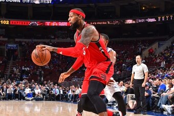 PHILADELPHIA,PA - NOVEMBER 11: James Johnson #3 of the Toronto Raptors dribbles the ball against the Philadelphia 76ers at Wells Fargo Center on November 11, 2015 in Philadelphia, Pennsylvania NOTE TO USER: User expressly acknowledges and agrees that, by 