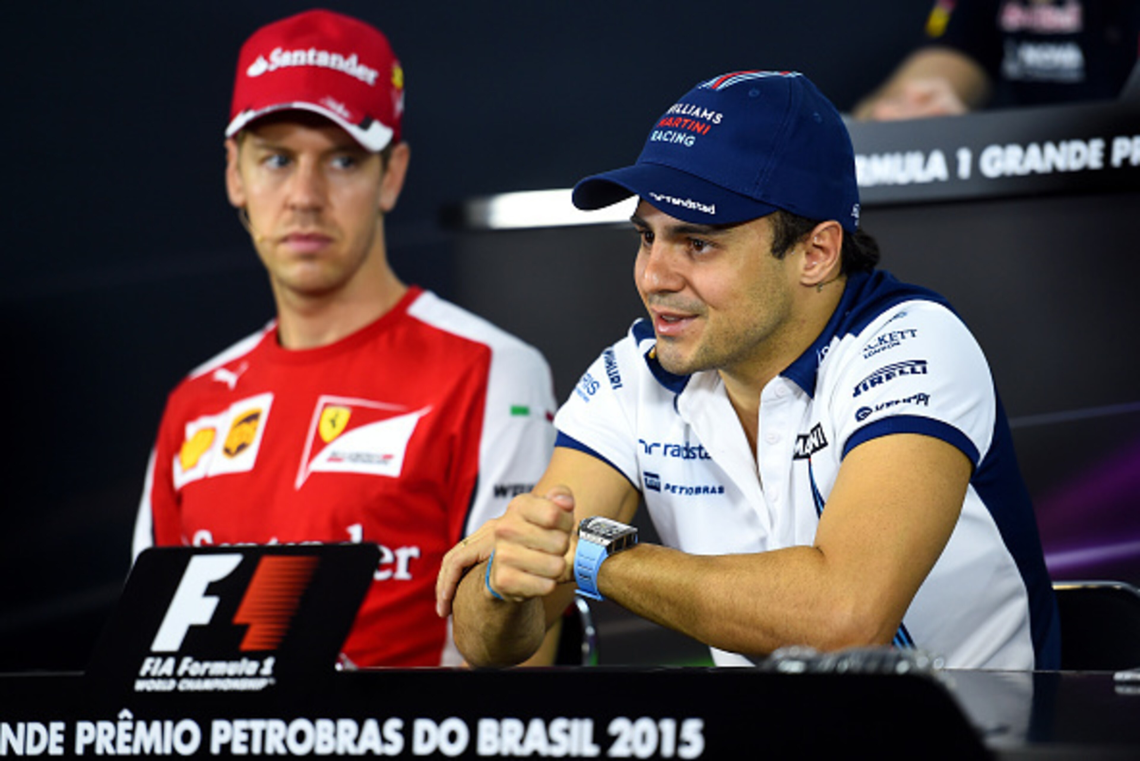 SAO PAULO, BRAZIL - NOVEMBER 12:  Sebastian Vettel of Germany and Ferrari and Felipe Massa of Brazil and Williams attend a press conference during previews for the Formula One Grand Prix of Brazil at Autodromo Jose Carlos Pace on November 12, 2015 in Sao 