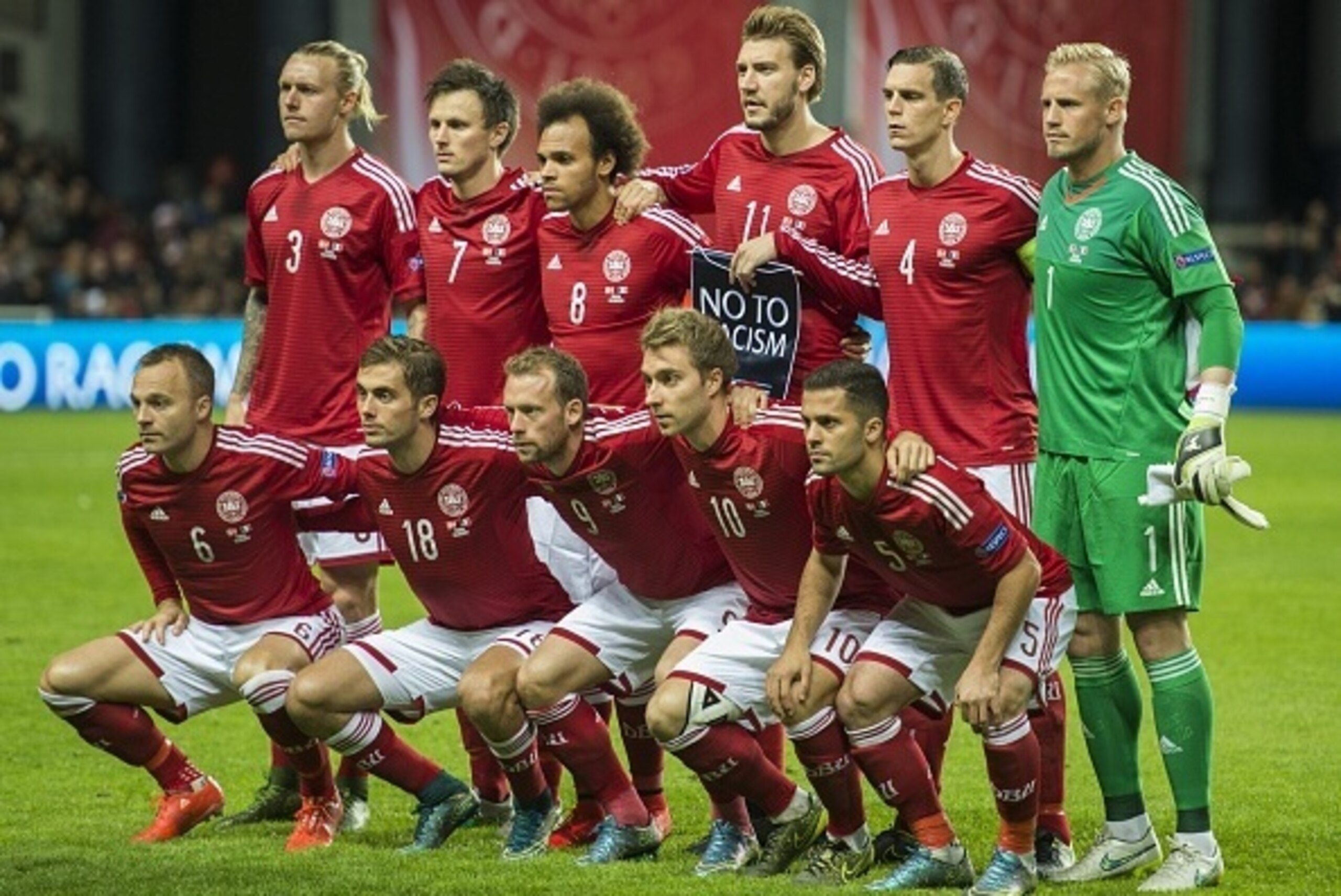 Denmark's players pose for a team picture prior to the friendly international football match between Denmark and the hosts of the Euro 2016 France at Parken arena in Copenhagen on October 11, 2015: (front row, L-R) Lars Jacobsen, Jakob Poulsen, Michael Kr