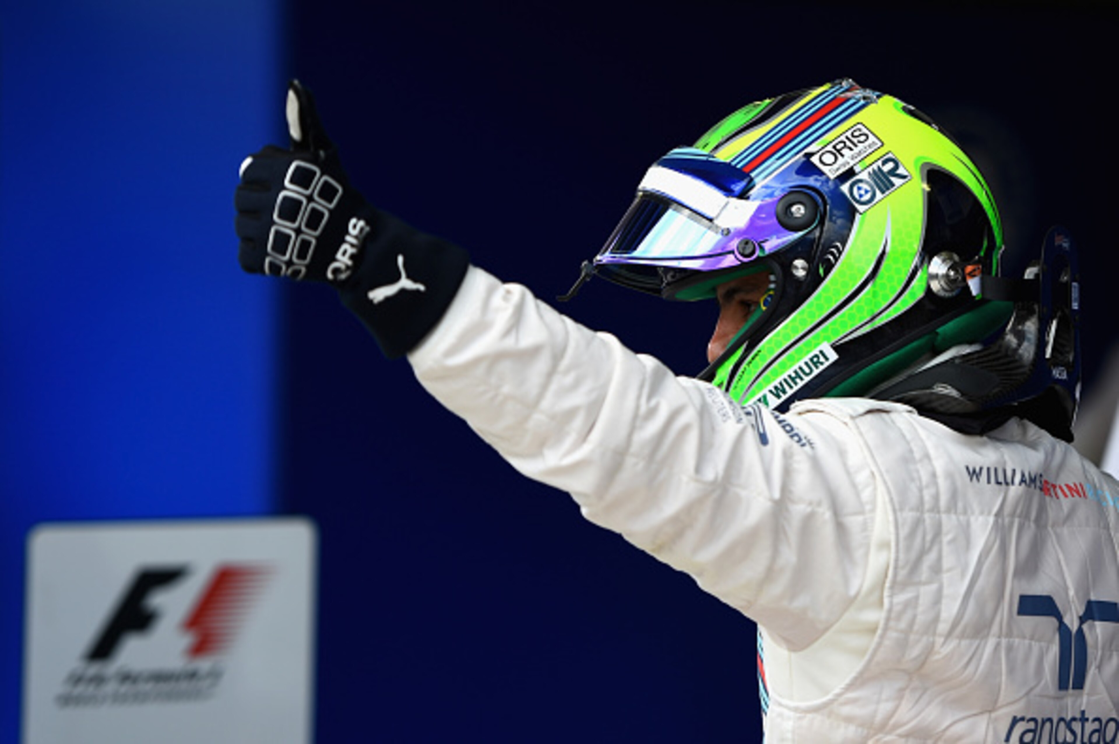 SAO PAULO, BRAZIL - NOVEMBER 09:  Felipe Massa of Brazil and Williams celebrates in Parc Ferme after finishing third in the Brazilian Formula One Grand Prix at Autodromo Jose Carlos Pace on November 9, 2014 in Sao Paulo, Brazil.  (Photo by Paul Gilham/Get