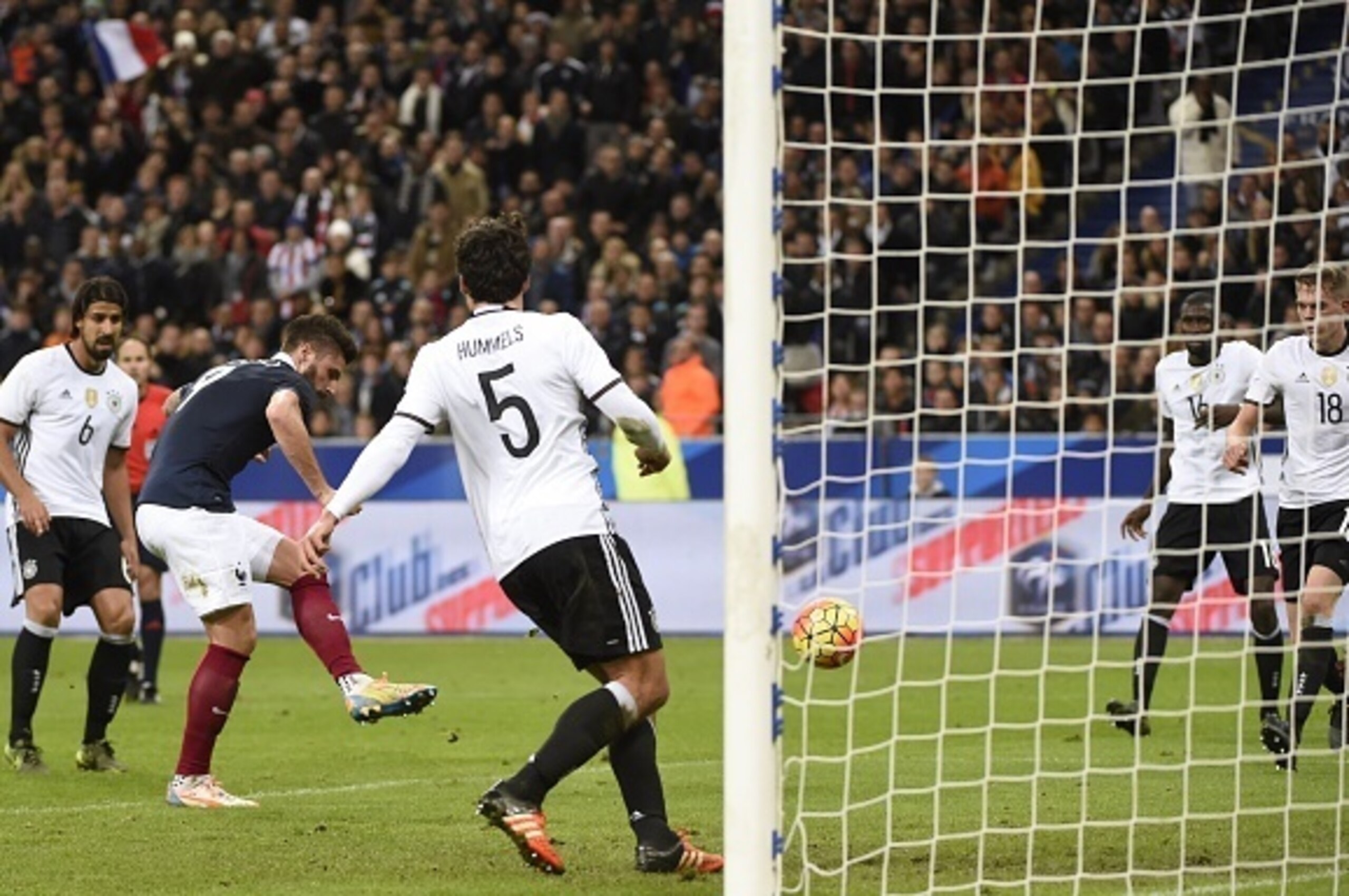 French forward Olivier Giroud (2nd L) shoots to score the opening goal during a friendly international football match between France and Germany ahead of the Euro 2016, on November 13, 2015 at the Stade de France stadium in Saint-Denis, north of Paris. French forward Olivier Giroud (2nd L) shoots to score the opening goal during a friendly international football match between France and Germany ahead of the Euro 2016, on November 13, 2015 at the Stade de France stadium in Saint-Denis, north of Paris.
