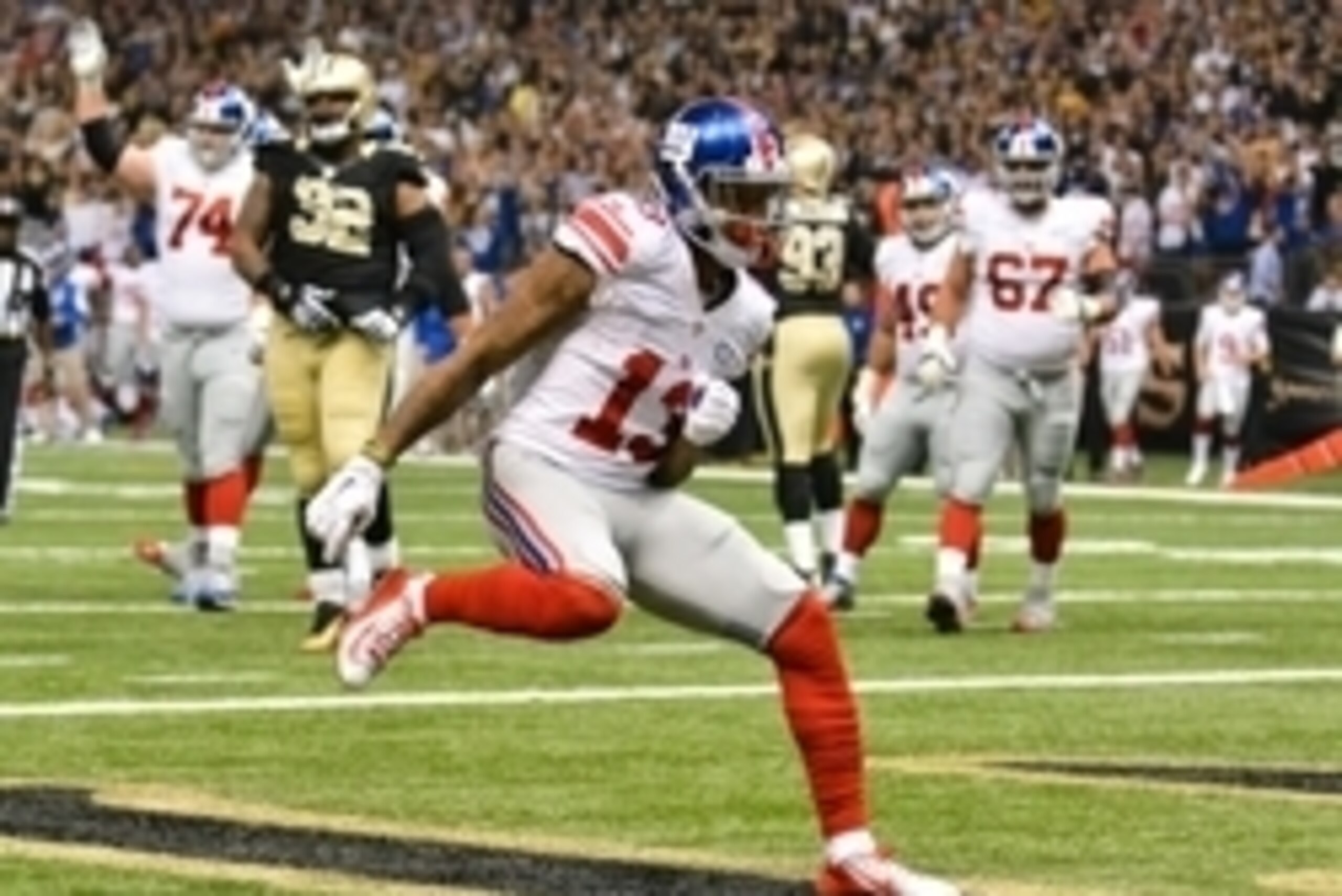 Nov 1, 2015; New Orleans, LA, USA; New York Giants wide receiver Odell Beckham (13) celebrates after a touchdown during the second quarter of the game against the New Orleans Saints at the Mercedes-Benz Superdome. The Saints defeated the Giants 52-49. Ma Nov 1, 2015; New Orleans, LA, USA; New York Giants wide receiver Odell Beckham (13) celebrates after a touchdown during the second quarter of the game against the New Orleans Saints at the Mercedes-Benz Superdome. The Saints defeated the Giants 52-49. Ma