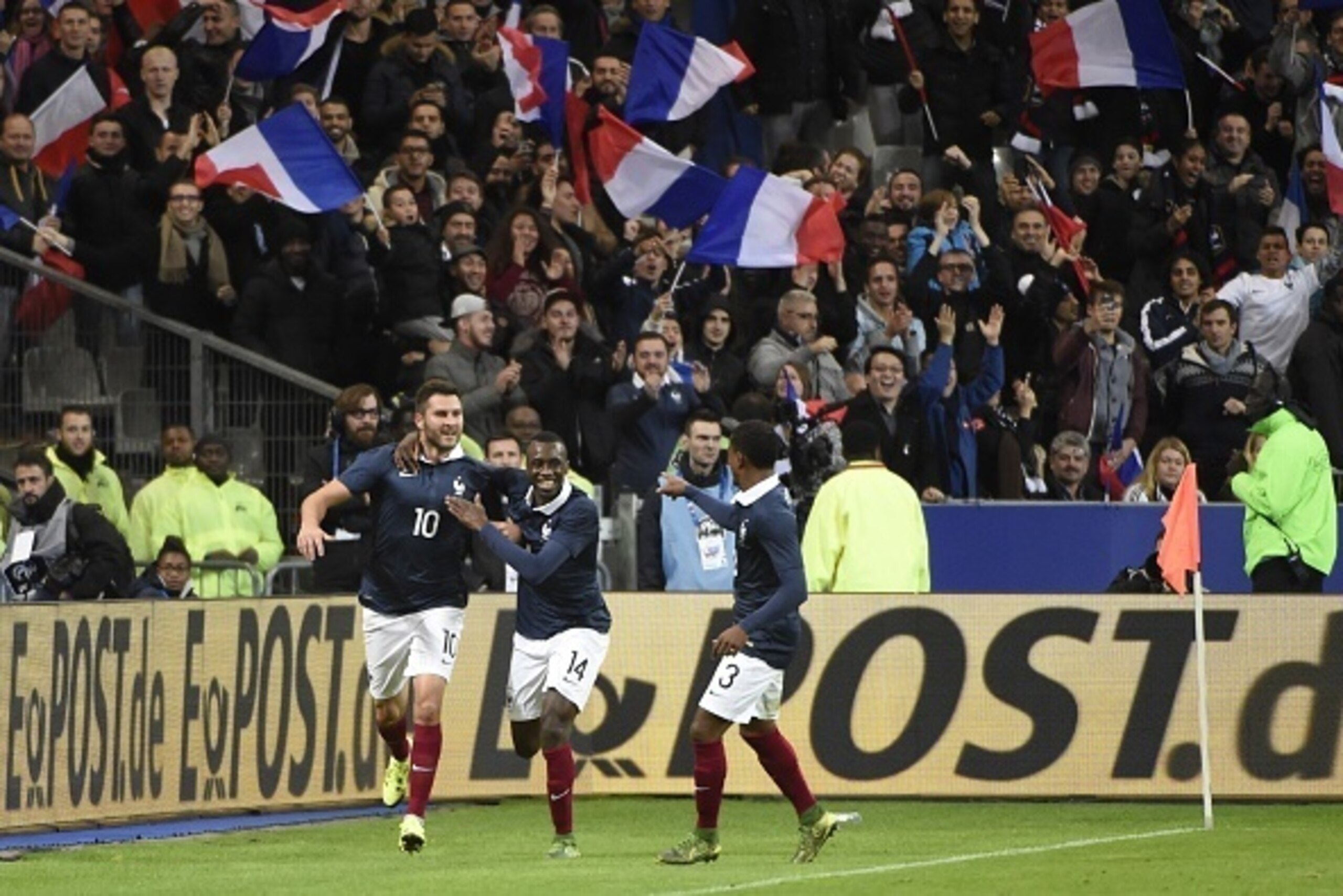 French forward Andre-Pierre Gignac (L) celebrates with French midfielder Blaise Matuidi (C) and French defender Patrice Evra after he scored during a friendly international football match between France and Germany ahead of the Euro 2016, on November 13, French forward Andre-Pierre Gignac (L) celebrates with French midfielder Blaise Matuidi (C) and French defender Patrice Evra after he scored during a friendly international football match between France and Germany ahead of the Euro 2016, on November 13,