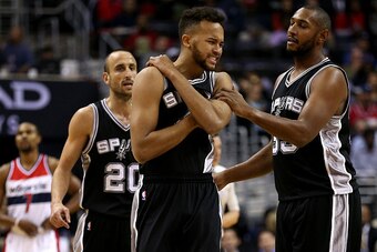 WASHINGTON, DC - NOVEMBER 04: Kyle Anderson #1 of the San Antonio Spurs reacts after being fouled against the Washington Wizards during the first half at Verizon Center on November 4, 2015 in Washington, DC. NOTE TO USER: User expressly acknowledges and a