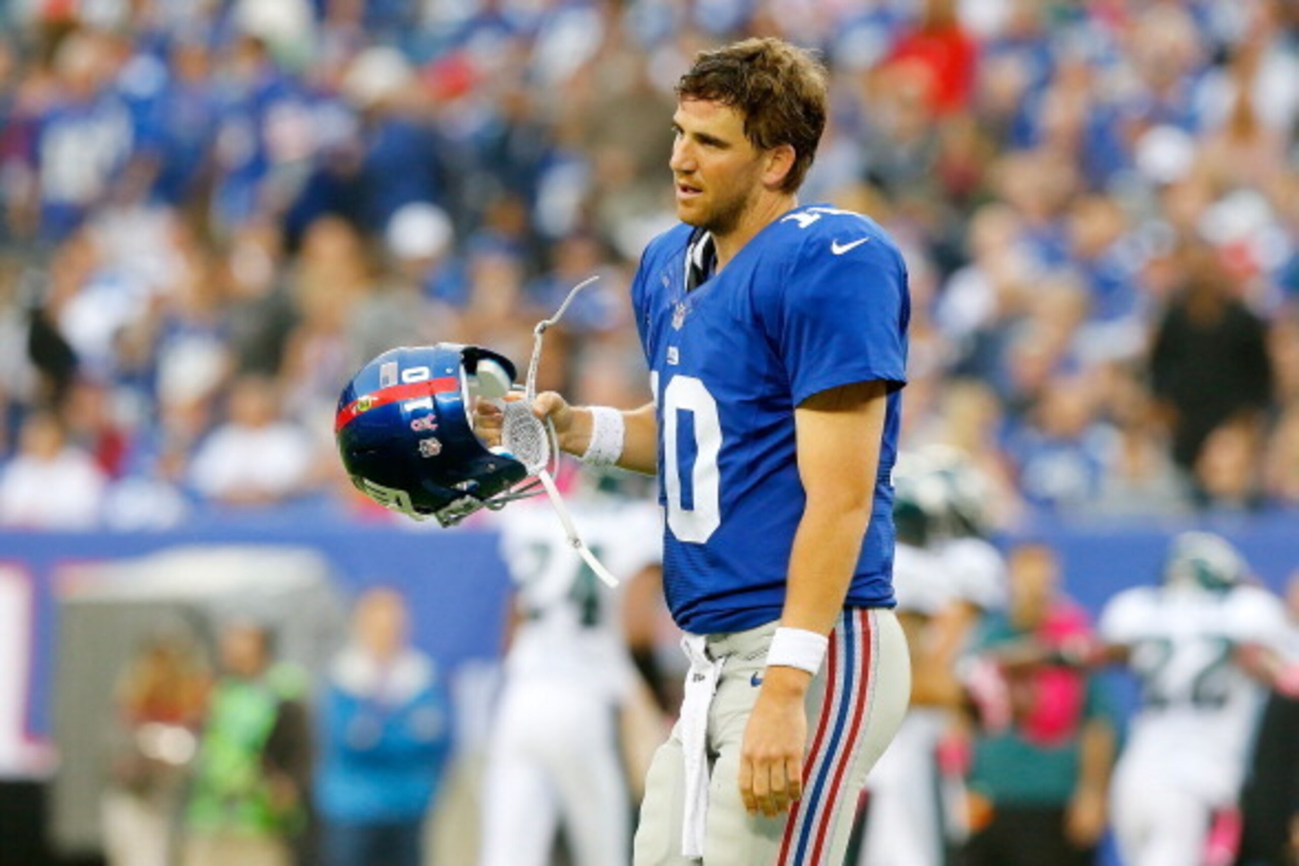 EAST RUTHERFORD, NJ - OCTOBER 06:  (NEW YORK DAILIES OUT)    Eli Manning #10 of the New York Giants looks on after throwing an interception in the second half against the Philadelphia Eagles on October 6, 2013 at MetLife Stadium in East Rutherford, New Je