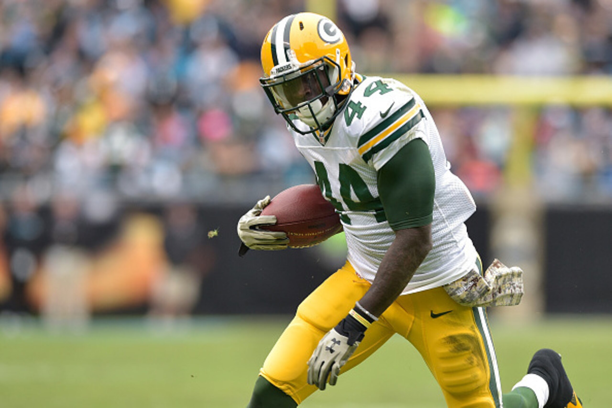 CHARLOTTE, NC - NOVEMBER 08:  James Starks #44 of the Green Bay Packers runs against the Carolina Panthers during their game at Bank of America Stadium on November 8, 2015 in Charlotte, North Carolina. The Panthers won 37-29.  (Photo by Grant Halverson/Ge