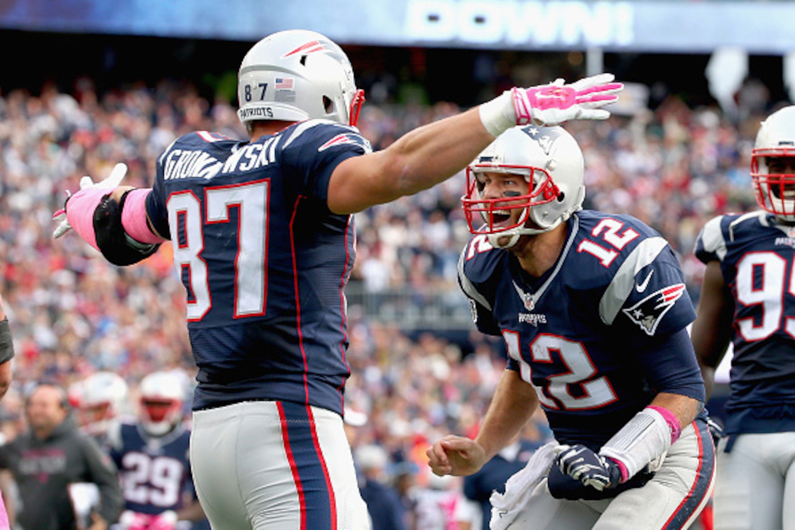 FOXBORO, MA - OCTOBER 25:  Tom Brady #12 and Rob Gronkowski #87 of the New England Patriots react after Gronkowski scored a touchdown during the fourth quarter against the New York Jets at Gillette Stadium on October 25, 2015 in Foxboro, Massachusetts.  (